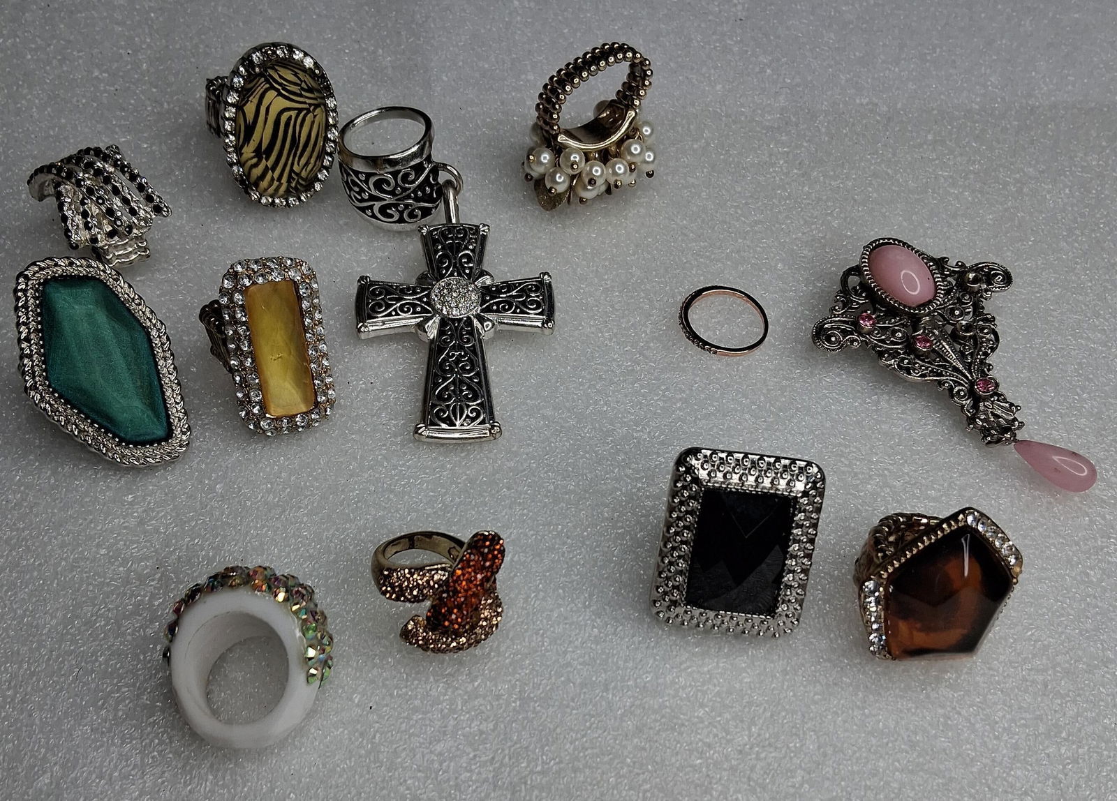 Costume jewelry rings ,brooch ,and pendant: .