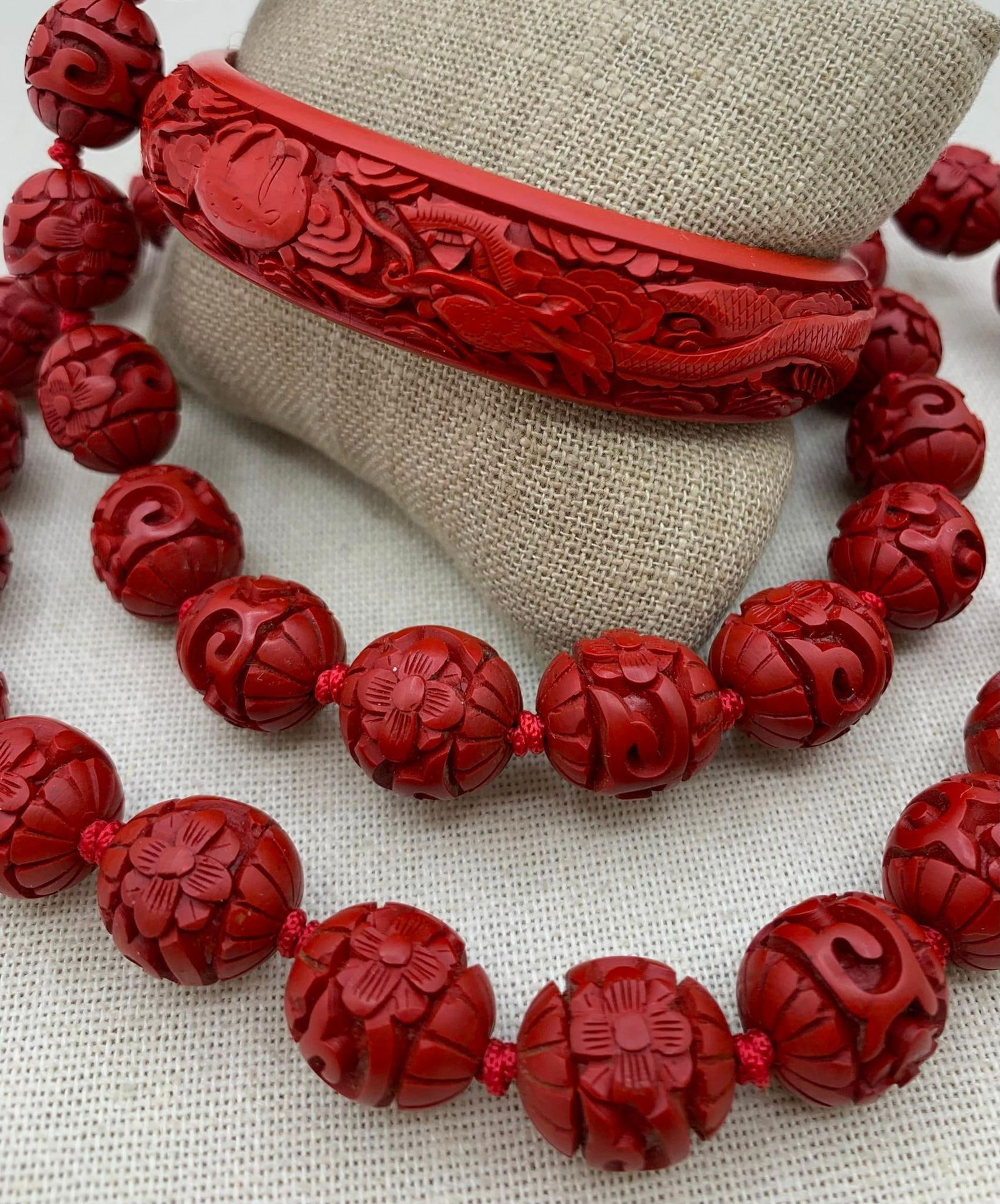 2 pc 1940s Carved Chinese Cinnabar Dragon Bangle Bracelet Large Barrel Bead Necklace: * Twin carved dragons, 5/8; width bangle, 2 1/2; across the interior of the bracelet* 30; necklace length, working brass closure, large 16mm carved beads, hand knotted