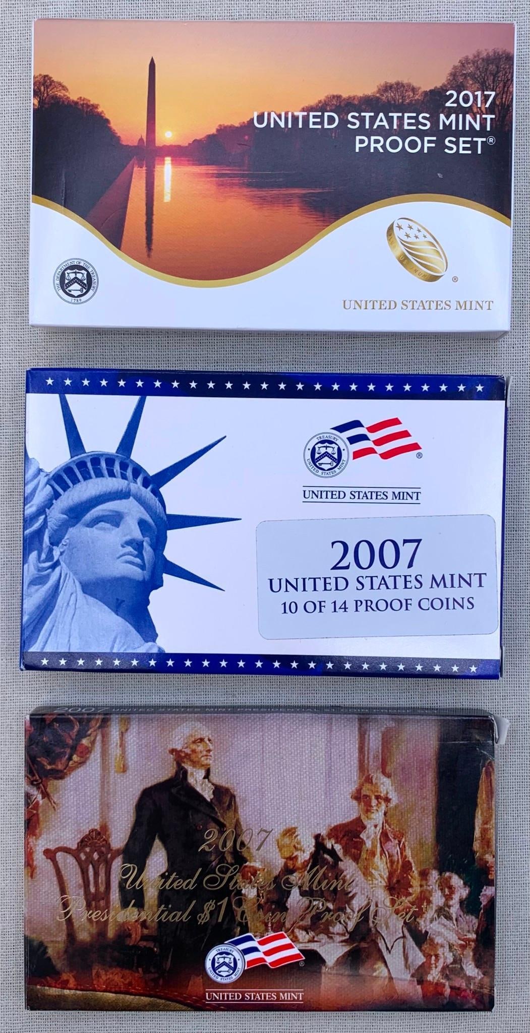 3 Boxes 2007 and 2017 United States Mint Proof Coin Sets: * 2007 US mint proof set containing two cases of coins, original box and paperwork* 2007 US mint Presidential $1 coin proof set with the original box and paperwork* 2017 US mint proof set containing