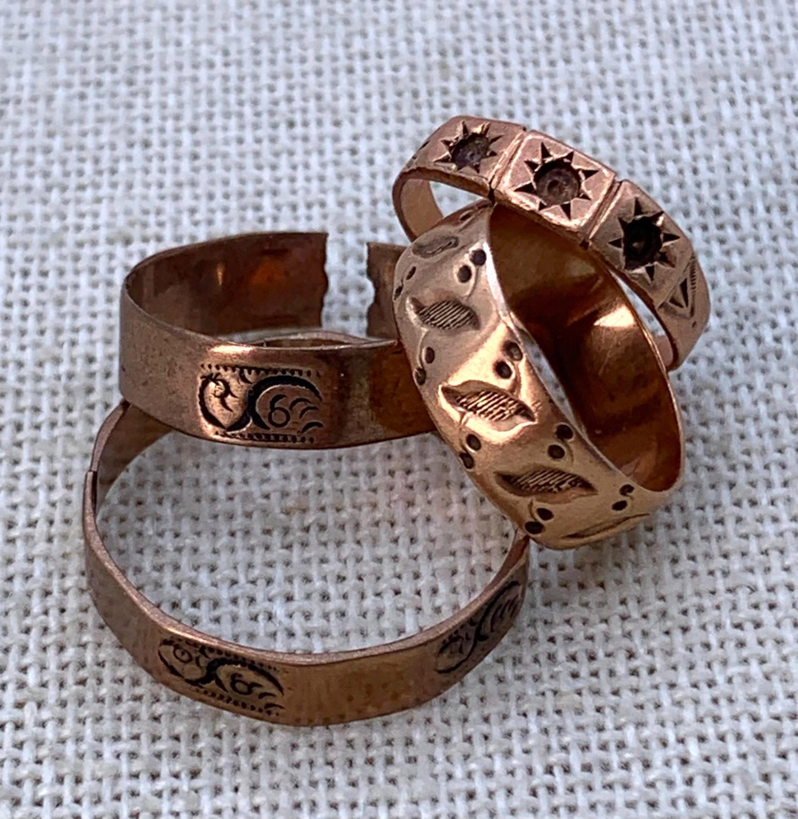 Four 14k-10k Gold Antique Victorian Wedding Bands Child Size Engraved Rings: * Tested 14k, embossed leaf detail, 1 gram weight, approx. size 1* Tested 14k, embossed star detail, .6 gram weight, approx. size 1, petite gemstone accents absent* Matching pair, tested 10k, each