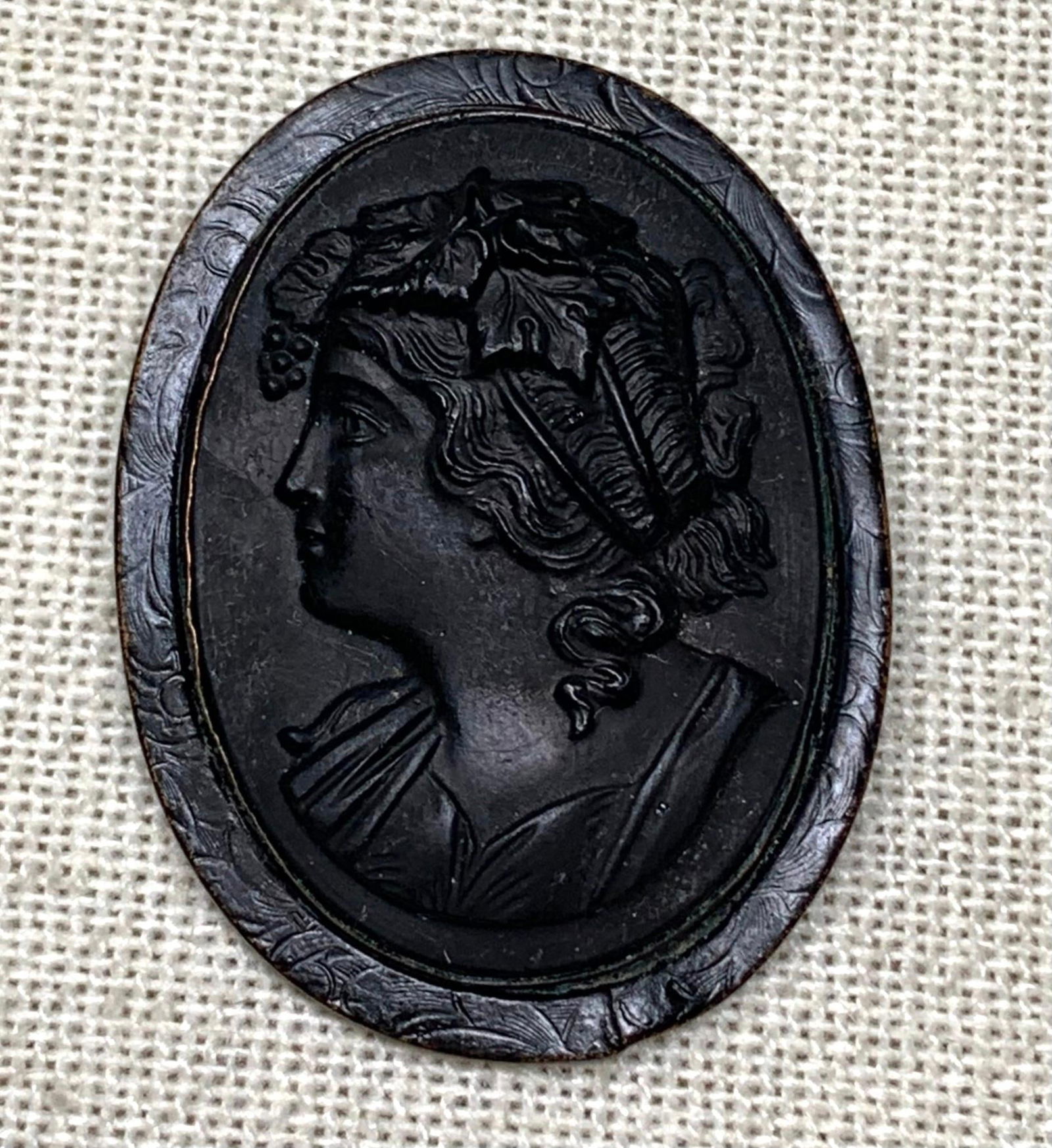 Antique Civil War era Matte Black Glass Raven Metal Cameo C Clasp Mourning Brooch: 1 1/2" x 1 1/8", matte black glass cameo, embossed flat raven black enamel brass frame, working C clasp.