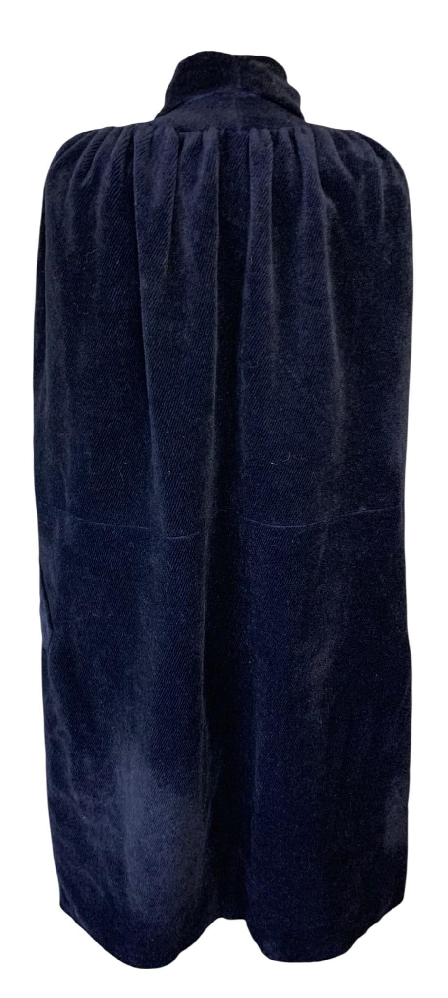 Timeless c1930s Navy Blue Ribbed Wool Cloak, Vintage Cape: Composite clasp at the throat for closure, seamed arm slits, lined with interior pocket, gathered shoulder and nape, lined collar, a few separations to the fabric and storage wrinkling to the lining,