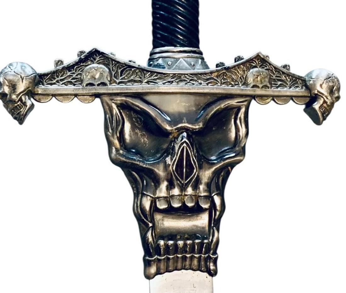 Huge RUSS FARRELL Frost Cutlery Double Sided SKULL Medieval Style Sword: 49" total length, 11" across the skull tipped hilt, skull detailing on both sides, Russ Farrell Frost Cutlery etched on one side of the blade, hefty in weight, light age and wear to the materials.