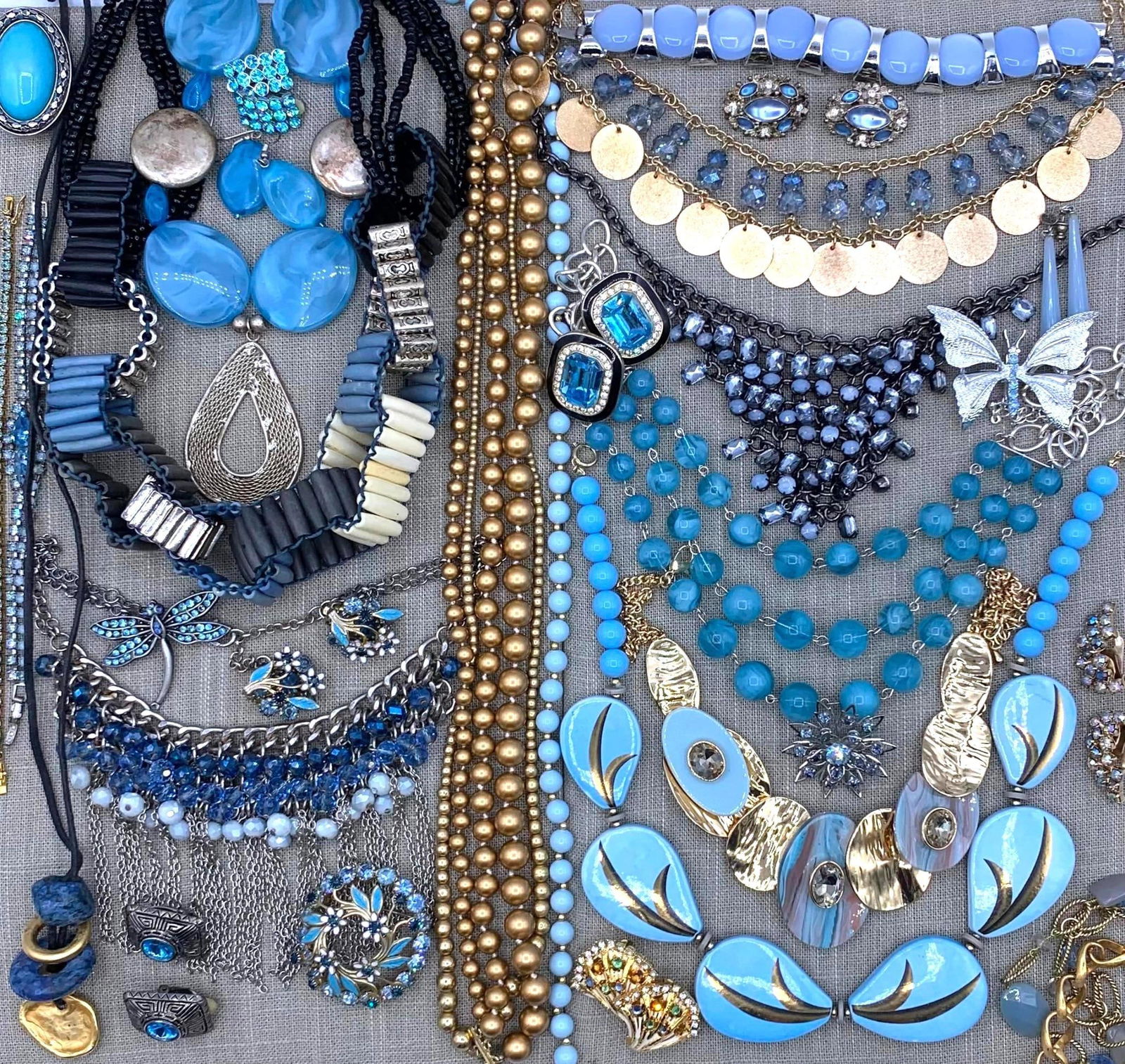 Ethereal 39 pc Vintage Shades of Blue Costume Jewelry Collection: WEISS, Mid Century draped confections, carved bone, marbled composite, glittering rhinestones, clip and pierced earrings, gilded metal, encrusted Dragonfly and Gerry's butterfly brooches, hand painted