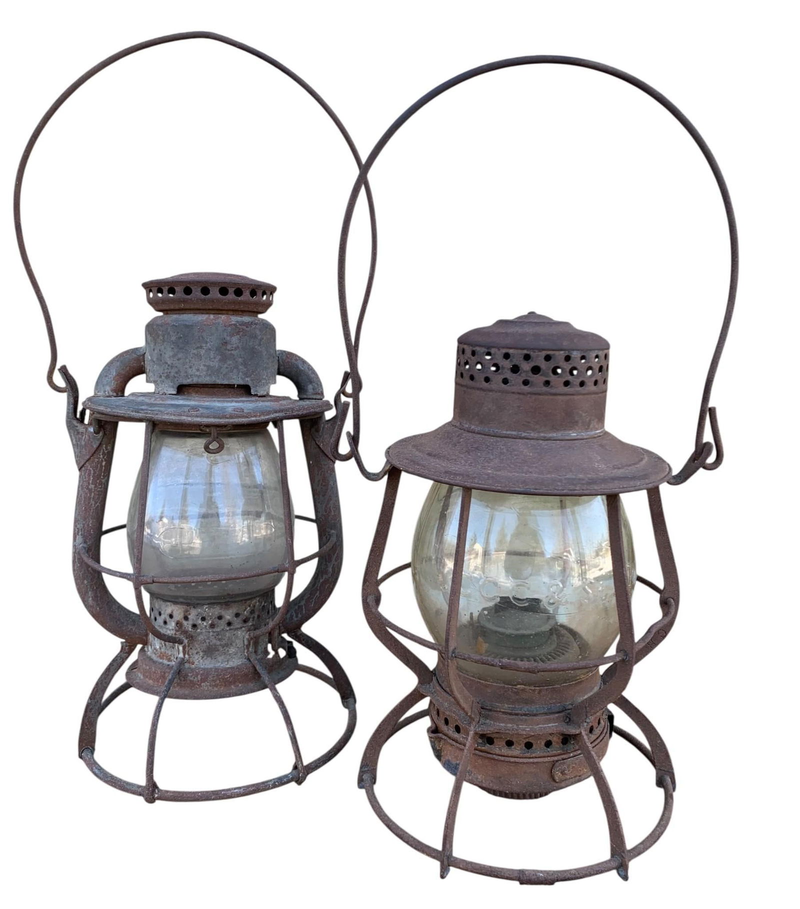 Two Early Railroad Lanterns: Cleveland, Cincinnati, Chicago St. Louis Railway: 1 with a C C C St. L RY embossed clear glass globe (Cleveland, Cincinnati, Chicago St Louis Railway), both with age appropriate wear, handles are present.