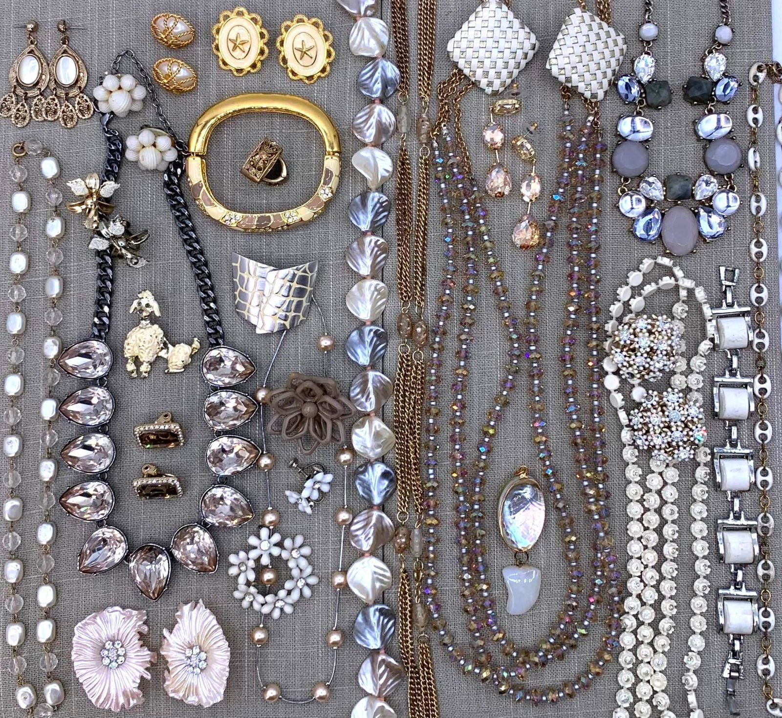 Luminous 41 pc 1940s to 90's Vintage Jewelry Collection: Faceted crystals, pearlized composite adornments, faux pearls, glittering rhinestones, vintage brooches, pierced, screw back and clip earrings, dramatic statement necklaces, Joan Rivers enamel bangle,