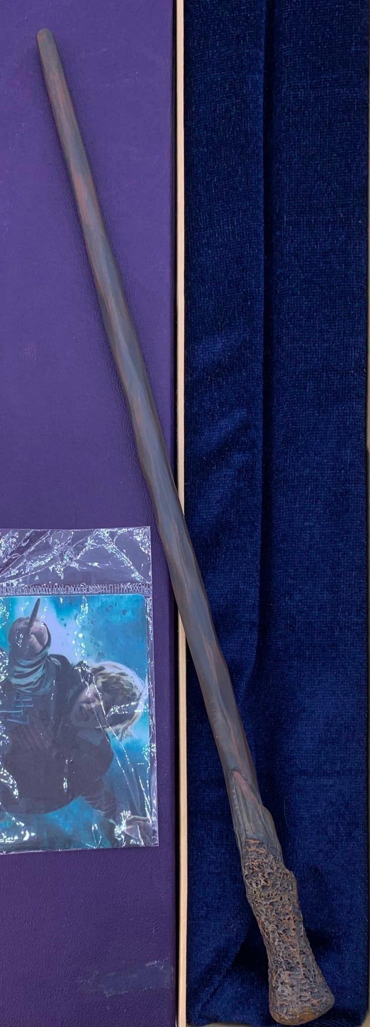Classic Harry Potter Wizarding Saga Ron Weasley's Magicians Wand with the Box: Plastic sealed magician card, velvet lined interior, composite wand with the original 16 5/8" long box, marked Ron Weasley.