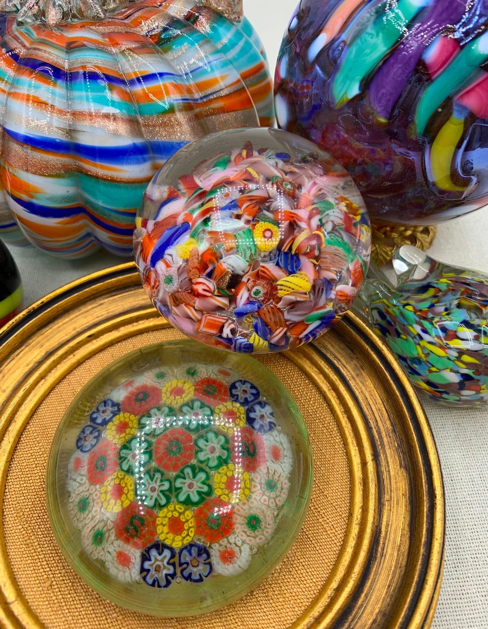 6 pc Vintage Mid Century Murano Millefiori, Ribbon Scramble, Vortex Art Glass Pieces: * Early Murano ribbon scramble paperweight, 2 1/2; x 1 7/8;, wear to the base from genuine age* Mid Century Murano Millefiori paperweight, mounted on fabric, framed in burnished wood, 5 1/2;* Vintage