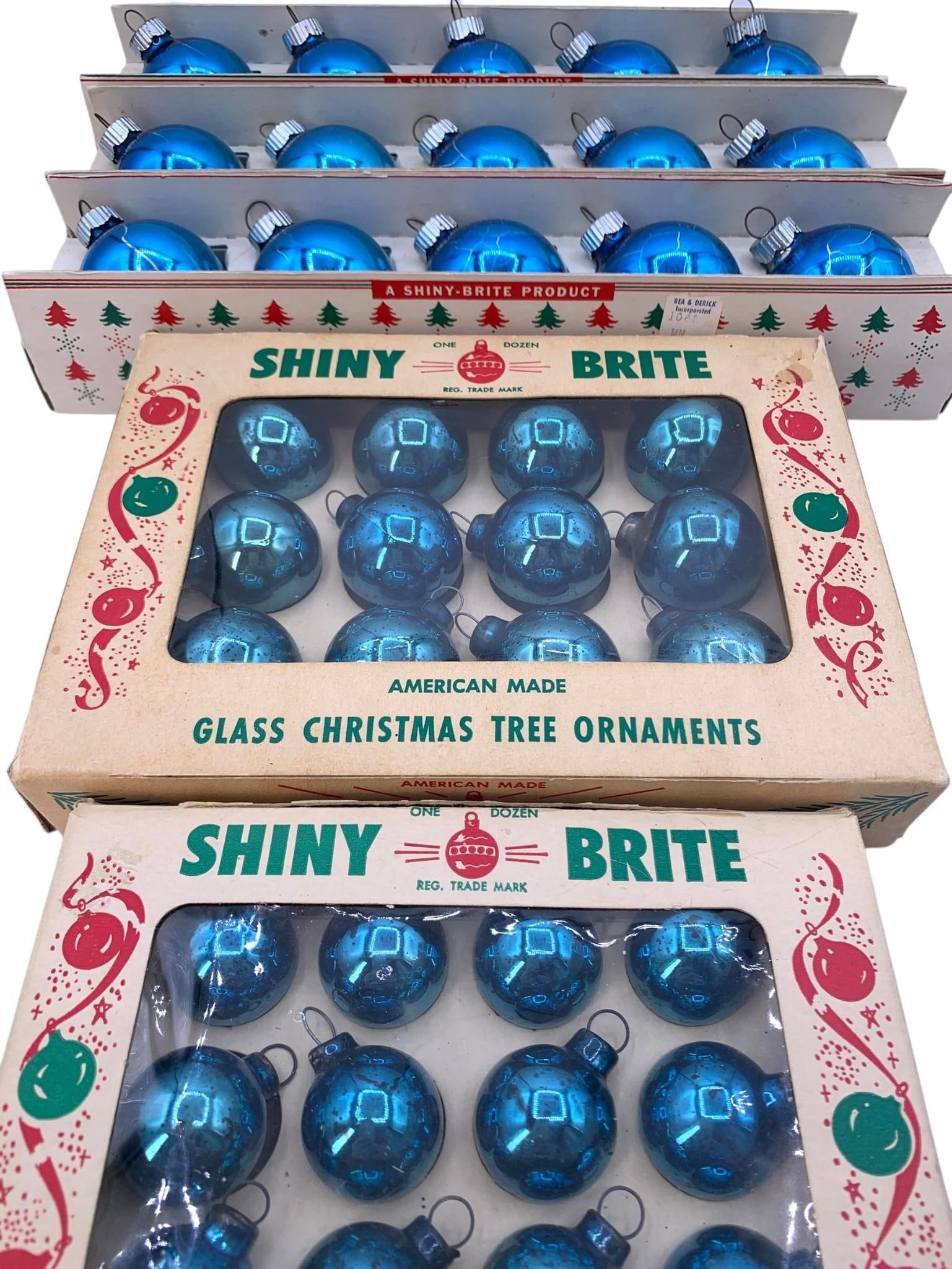 44 Mid Century Sapphire Blue SHINY BRITE Mercury Glass Christmas Ornaments in the Original SB Boxes: 4 clean Mid Century Shiny Brite 5 bulb boxes with Sapphire glass bulbs and Shiny Brite metal caps, and 2 miniature bulb boxes with 12 ornaments in each, some crazing to the larger bulbs with no struct