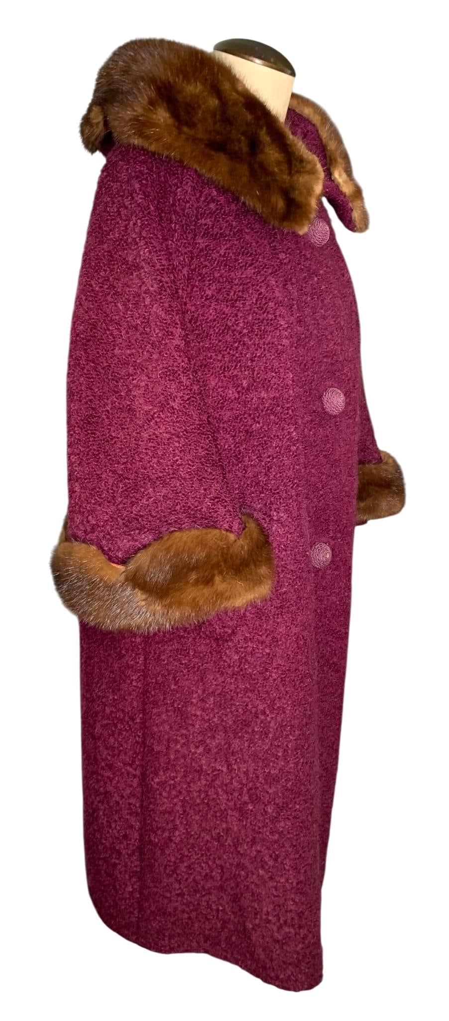 Luxe Mid Century Mahogany Mink Fur Trimmed Bordeaux Boucle Wool Coat: Rich bordeau hue, oversize button closure, bell bracelet length sleeves trimmed in Mink fur with a matching collar, usable pockets, lined in satin with wear to the lining at the nape and old stitches