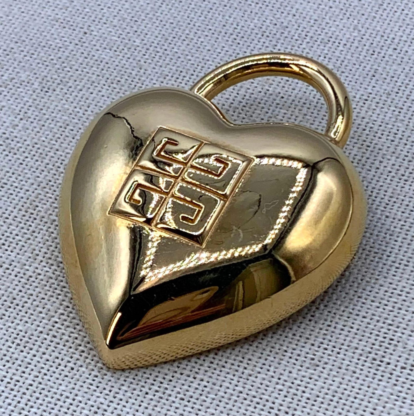 Large Vintage Givenchy 4 G Logo Heart Padlock Designer Brooch: Givenchy mark, 2 1/8" x 1 3/4", working pin.