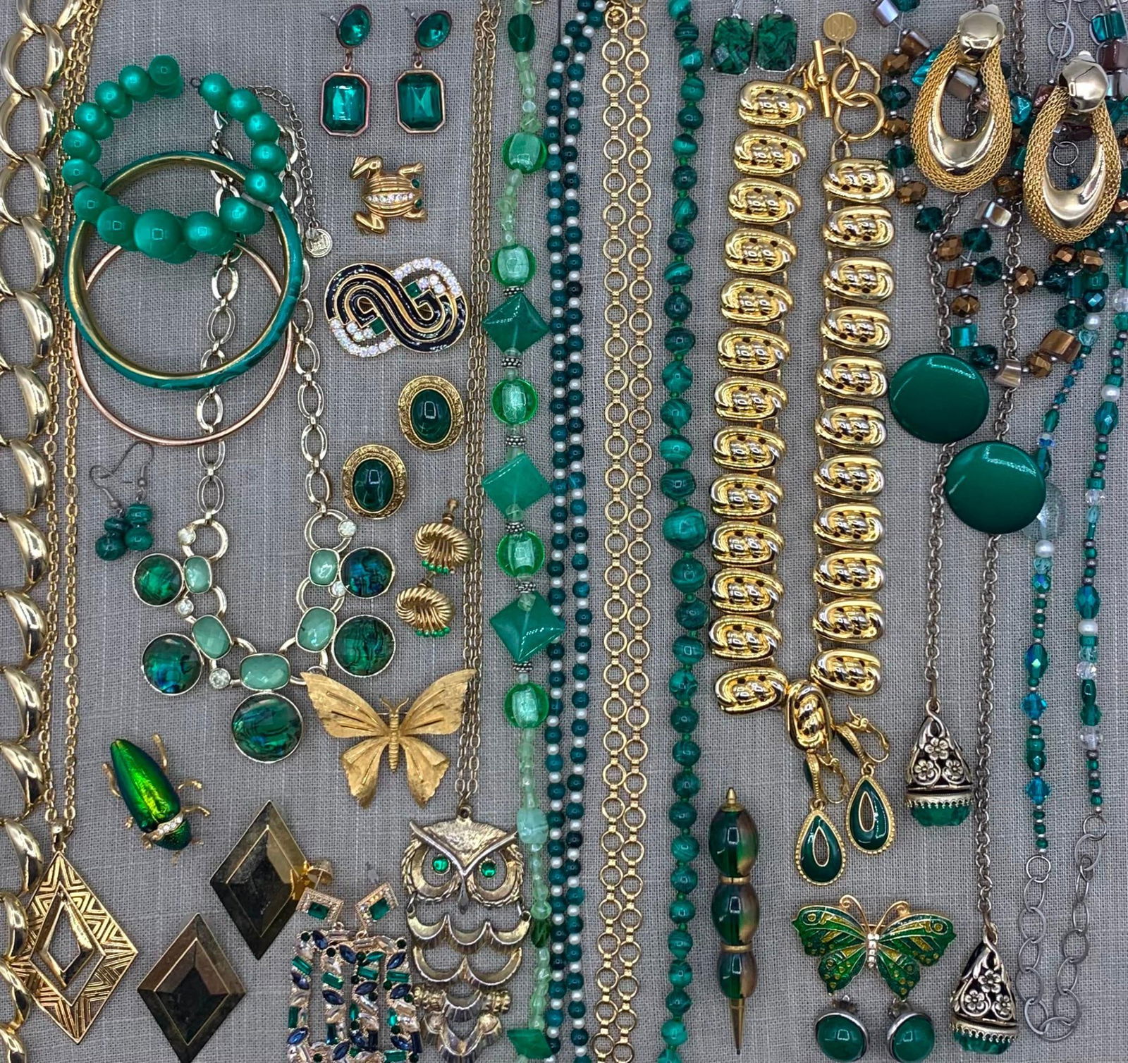 44 pc Beetle Green Costume Jewelry Collection: Butterflies, Frog and luminous green beetle brooches, cats eye grass green composite Mid Century wire wrap bracelet, natural Malachite adornments, MCM gilded sheen emerald green mechanical pencil, gli