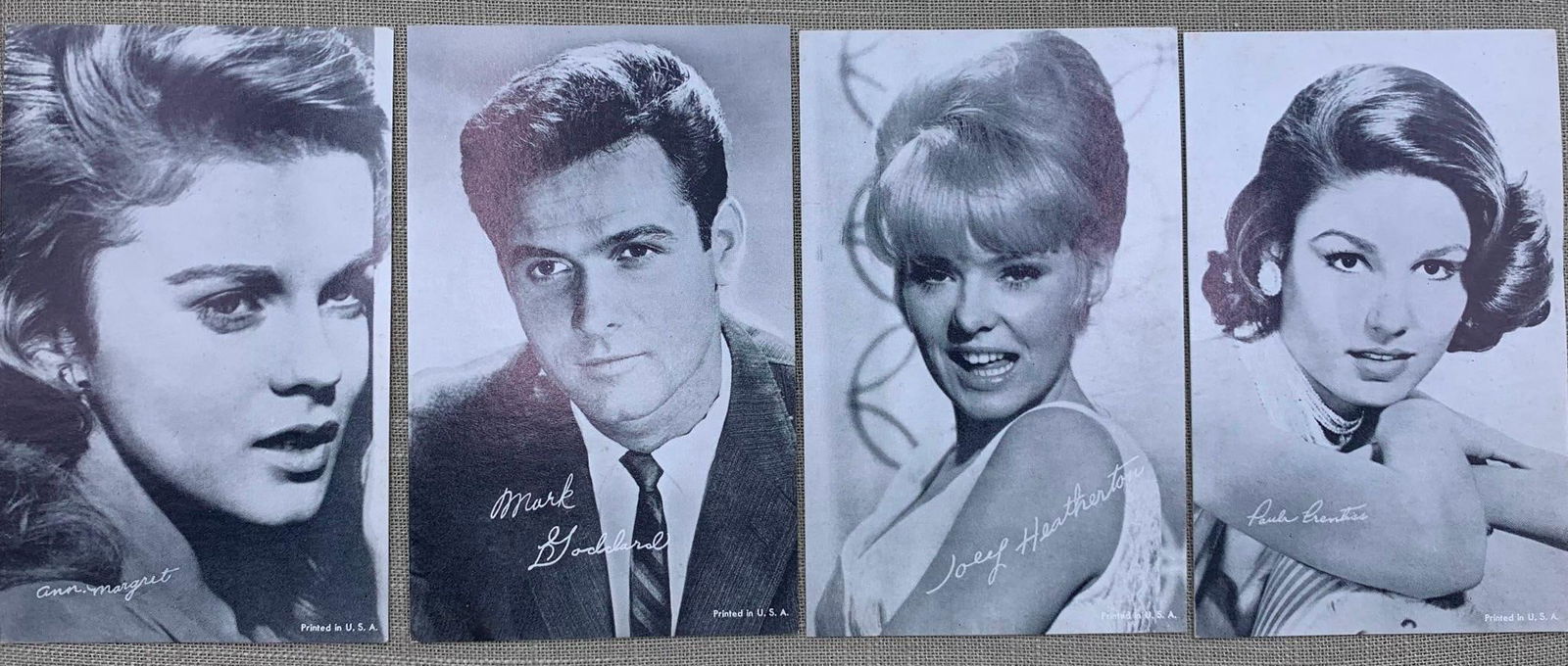 Iconic 70 pc Vintage Hollywood Actress, Singer, Actor, Penny Arcade Card Collection: 70 pcs showcasing 11 different actors/actress/singer superstars, scattered storage wear to some of the cards, black and white images, 5 3/8" x 3 3/8".