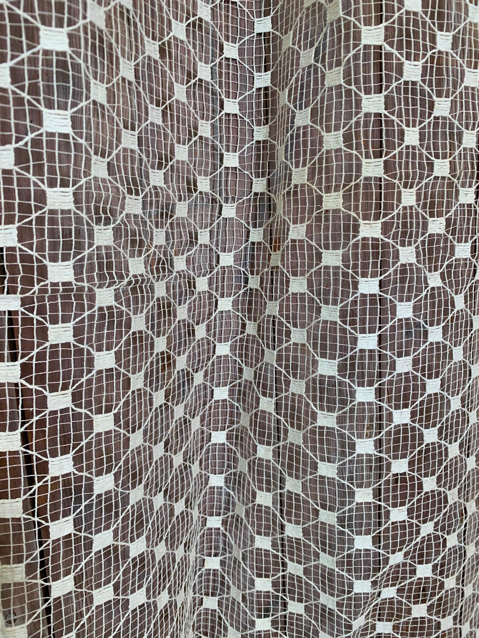 4 Vintage Windowpane Crochet Open Weave Lace Long Length Window Sheer Panel Curtain Set: 4 vintage panels, starched long ago before being stored for decades...76" x 48", one rectangular discoloration from the storage box lid, a half dollar size separation in the brides of one panel.