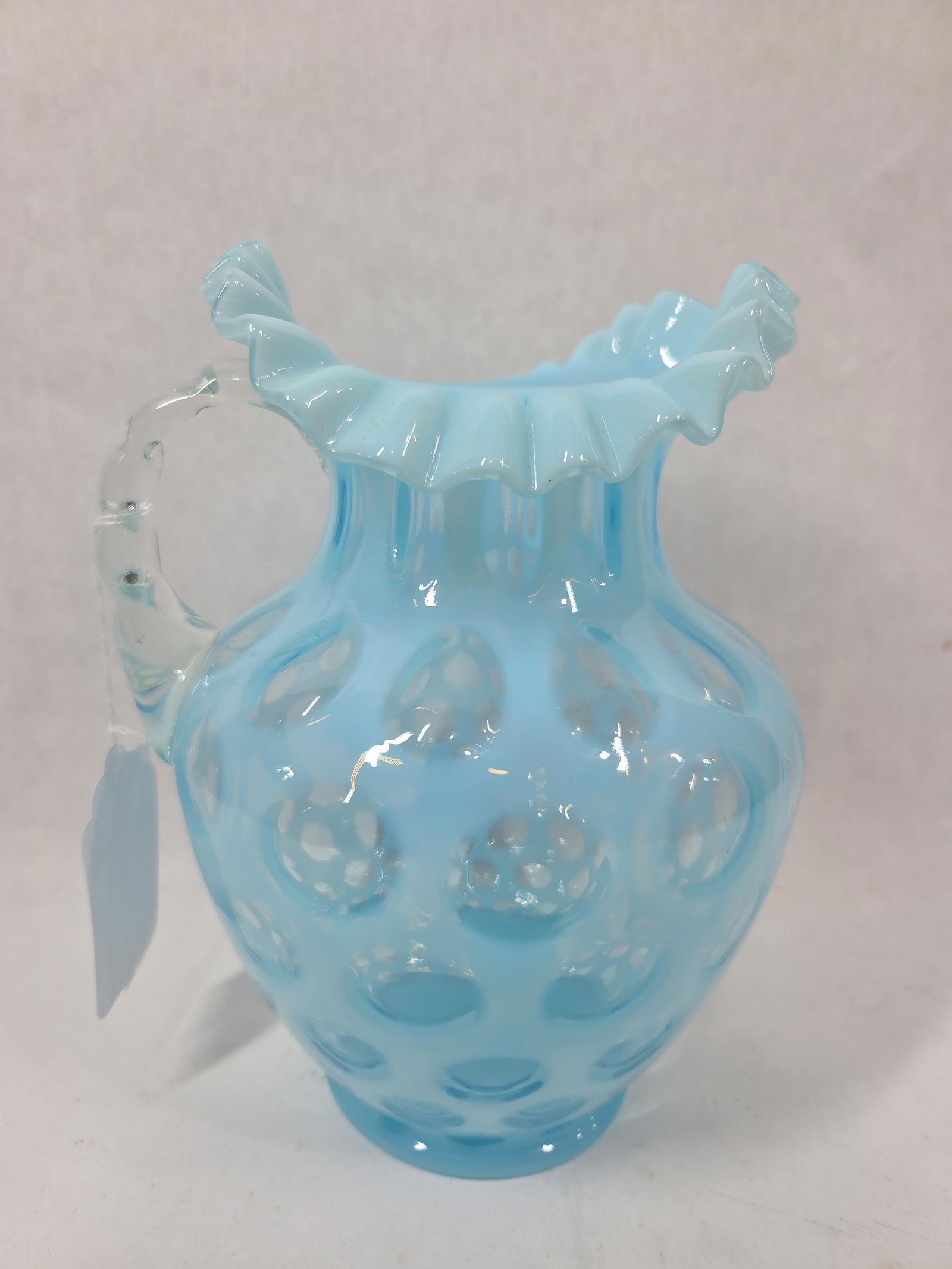 Fenton Large Opalescent Blue Coin Dot Double Crimped Handled Ewer: great condition with no chips, cracks or breaks standing 8.5 in H