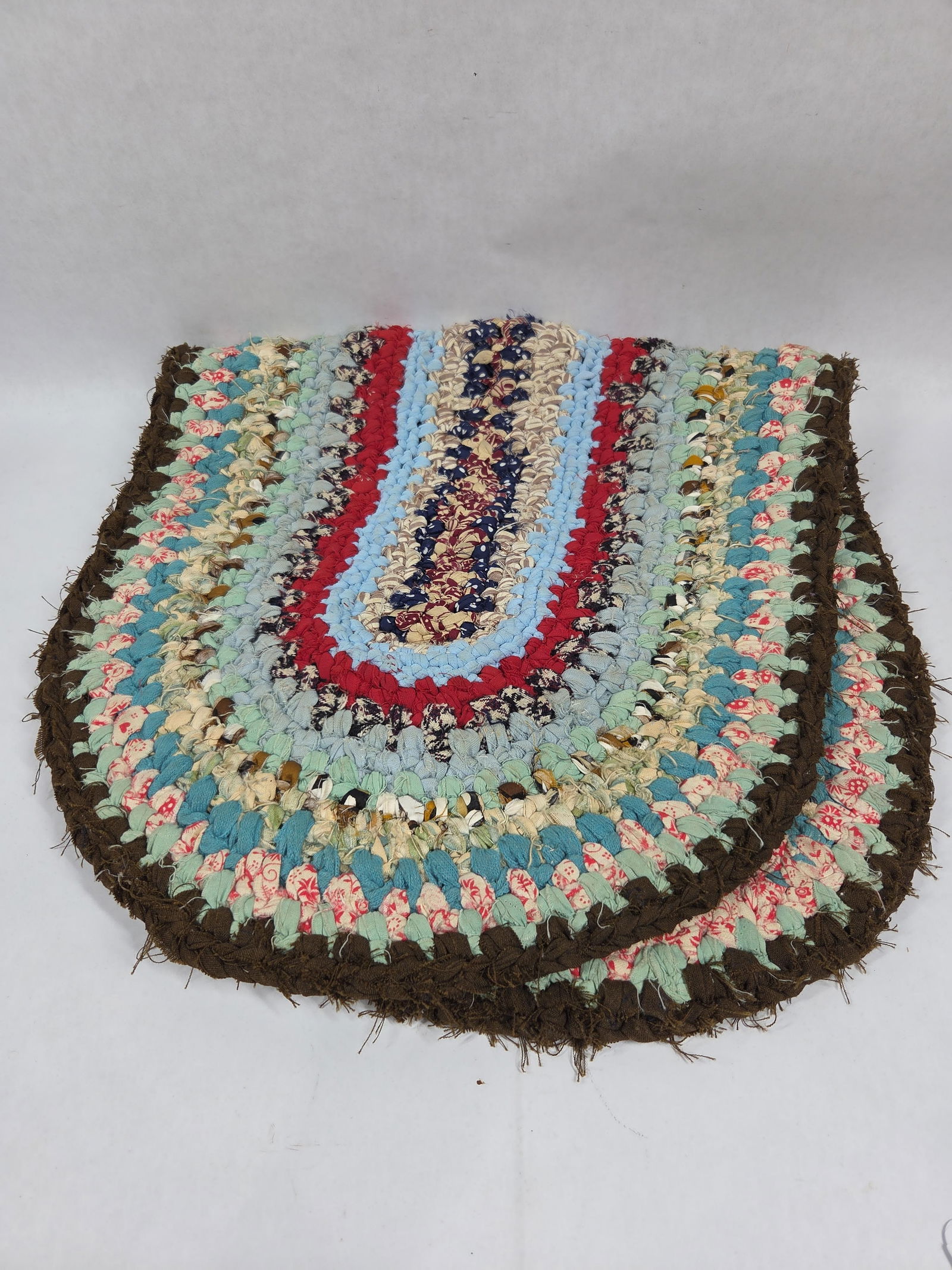 Primitive Hand Crafted Oval Braided Rag Rug w/ a Multi Textile Palette (1 of 3)