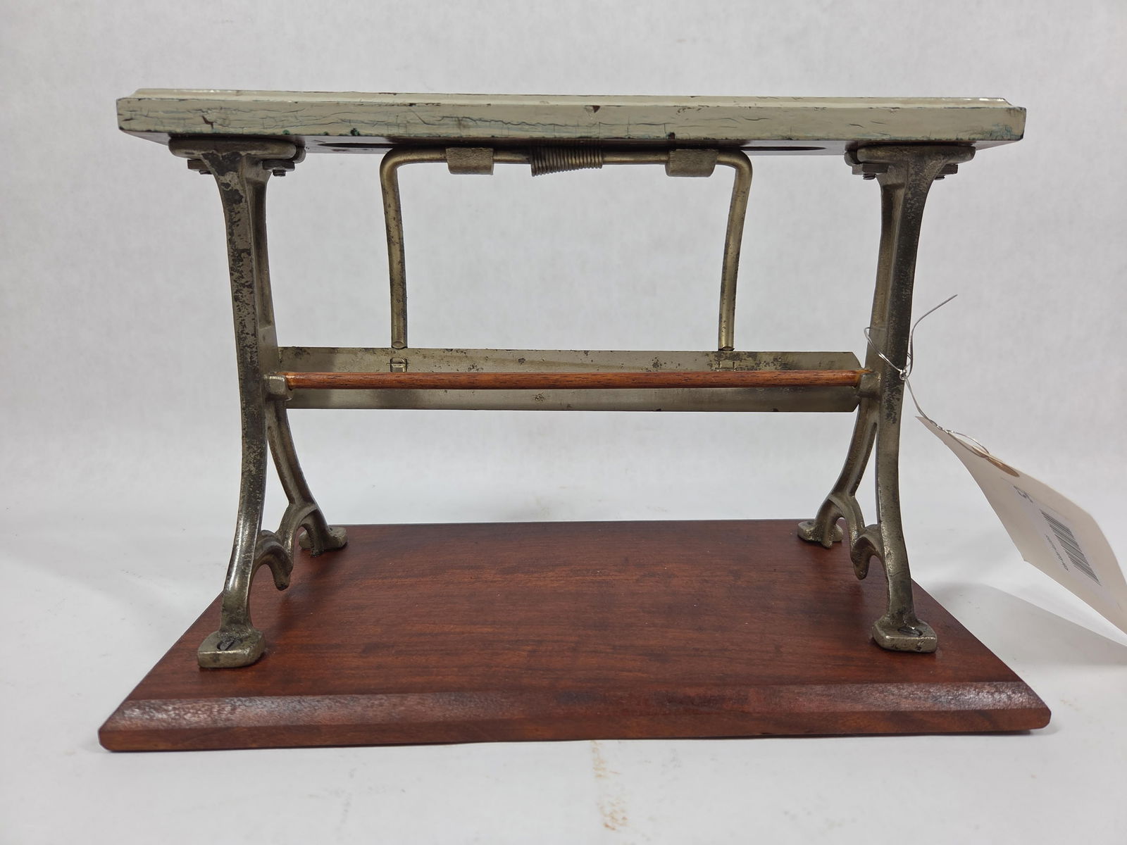 General Store Paper Roll Dispenser: This smaller sized indicates it may be a salesman sample. Great condition with cast sides and a wooden top and bottom. 10.5x6x7.5