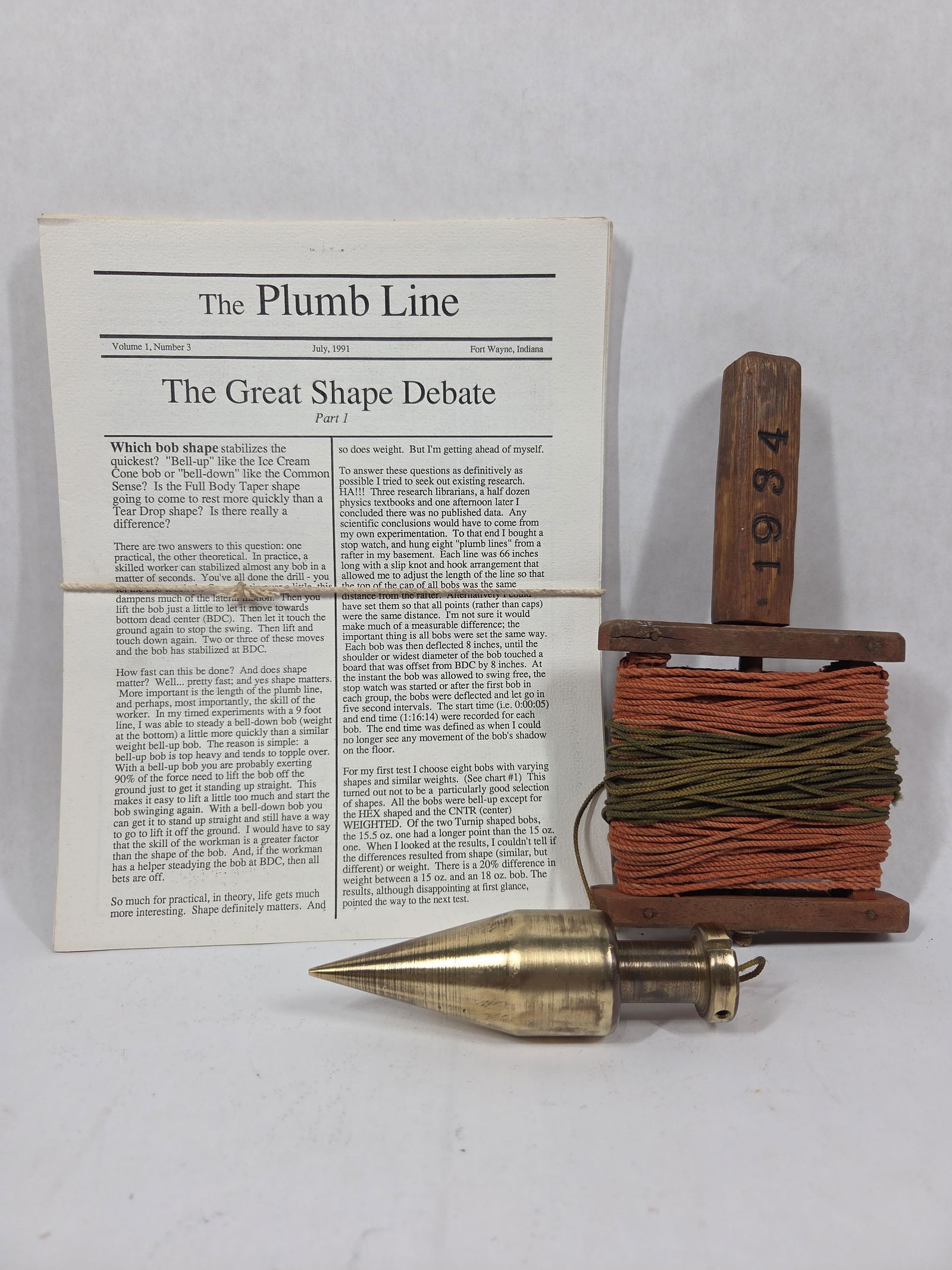 Brass Plumb Bob, Winder, & Plumb Line Publications: Winder dated 1934. Bob is 5.5 inches long