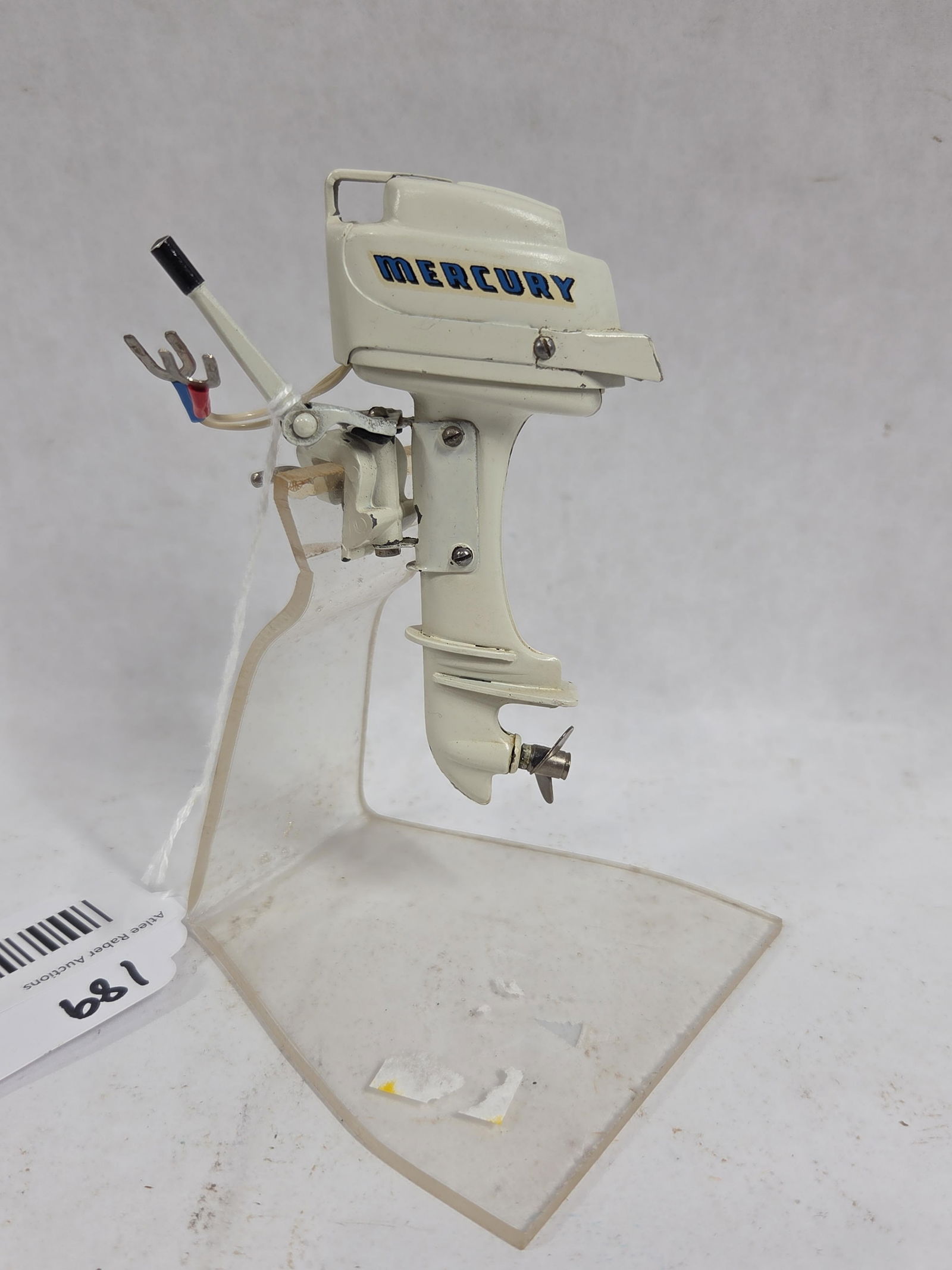 K & O 1957 Mercury Toy Outboard Motor w/ Acrylic Stand: appears to be in good condition 4 in.