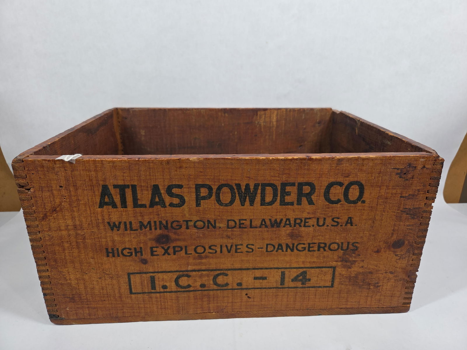 Atlas Powder Co Shipping Crate: Explosives crate with Atlas globe logo to both ends. Dovetailed corners. 17.5x13x8