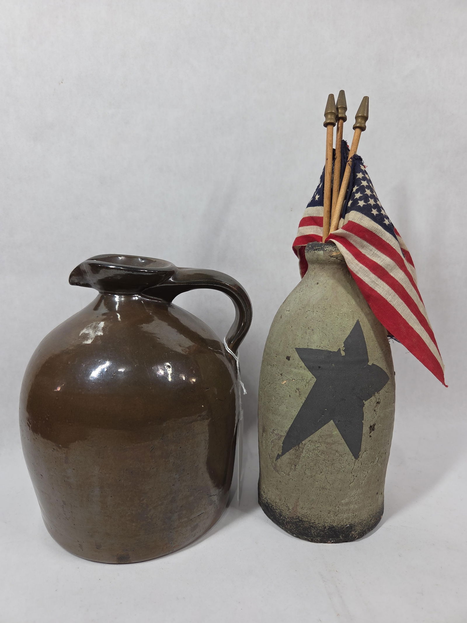 Decorative Stoneware Crock Jug Pitcher Lot inc. Memorial Flags as Well: This great stoneware lot includes two crocks both in overall good condition with minor areas of flaking