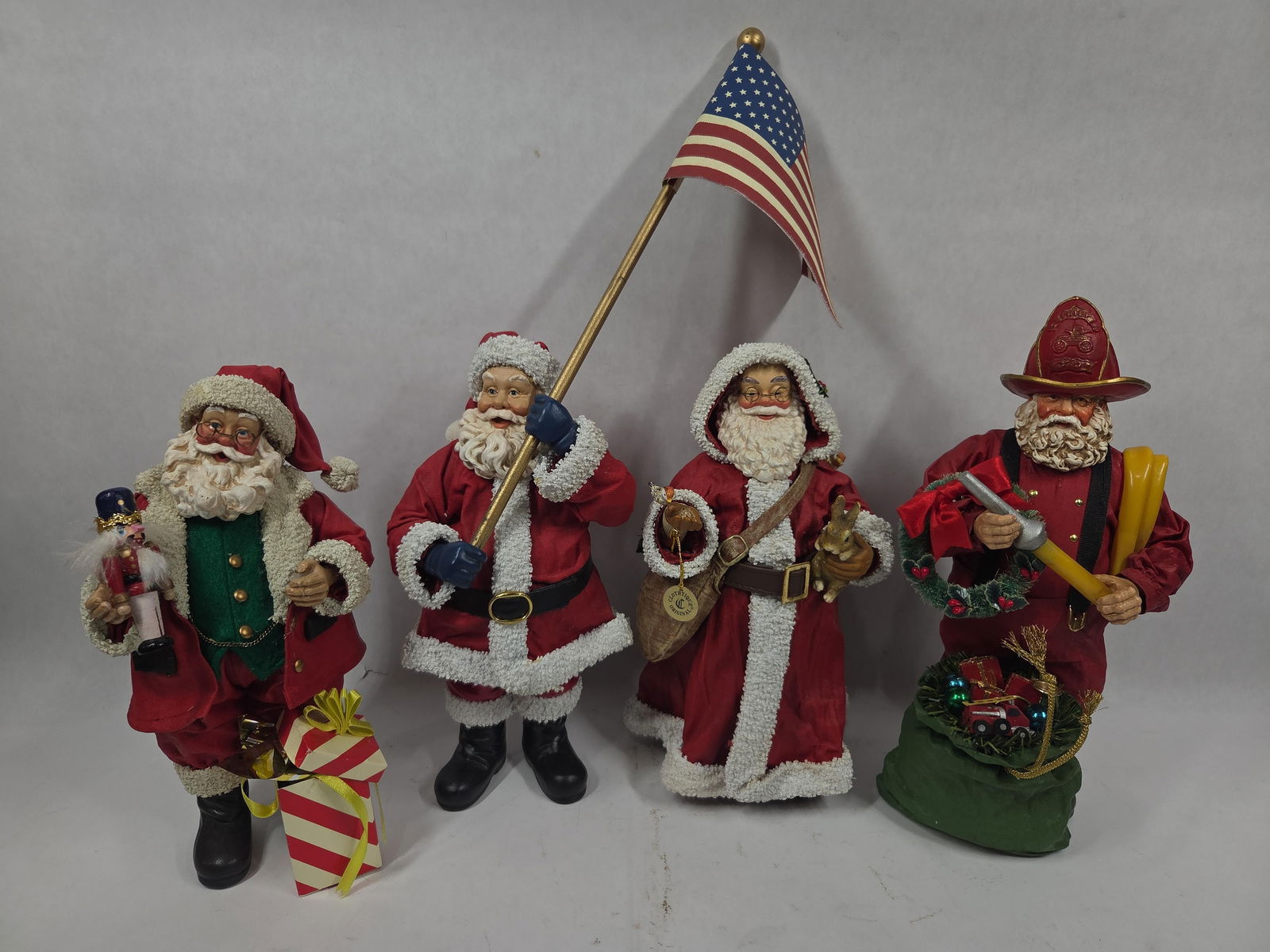 Clothtiques Possible Dreams Holiday Figurines Inc. Fireman Santa, God Bless America Inc. Signed Pce. (1 of 16)
