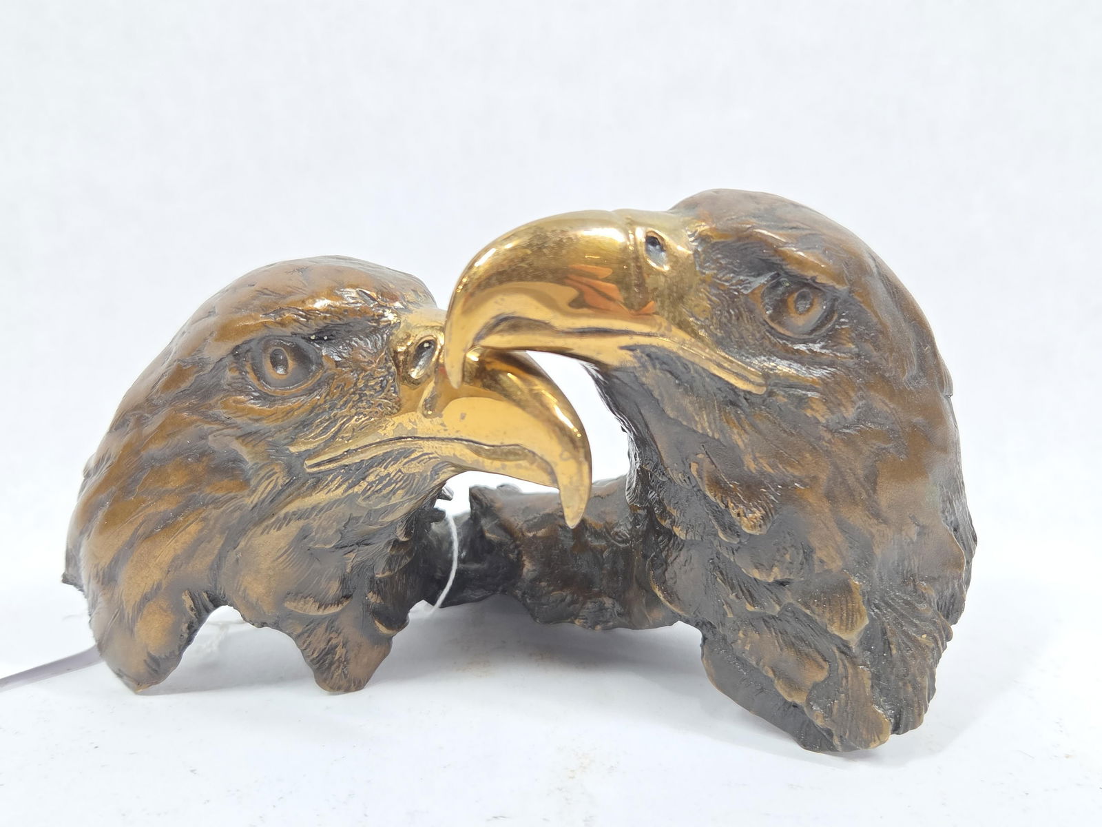 Brass Eagle Head Sculpture: Artist signed, numbered 736/2500. 5x7.