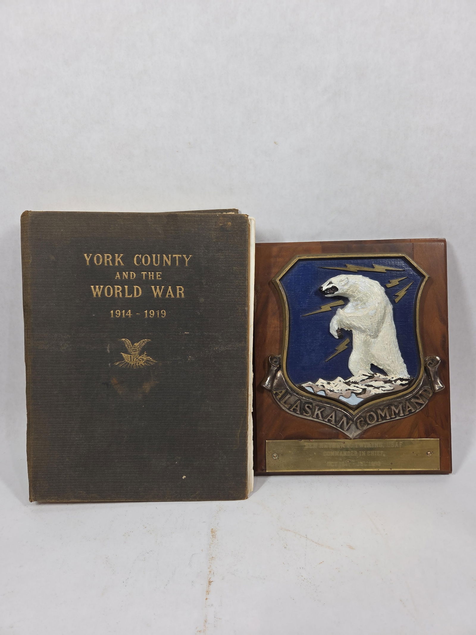 Alaskan Command Plaque & York County World War Book: Gen Nathan F. Twinine USAF Commander in Chirf1950. With Airforce Polar bear patch. WW book copyright York Pa. Binding shows some issues.