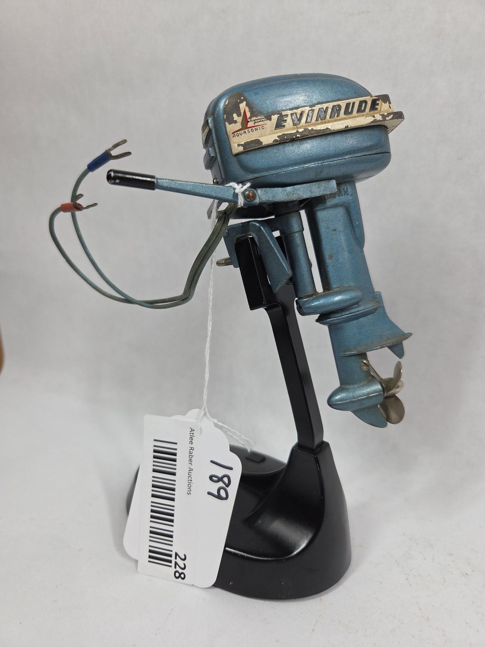 Evinrude Miniature Outboard Motor: Big Twin Electric 25, with wiring and stand. Not tested. 5inches