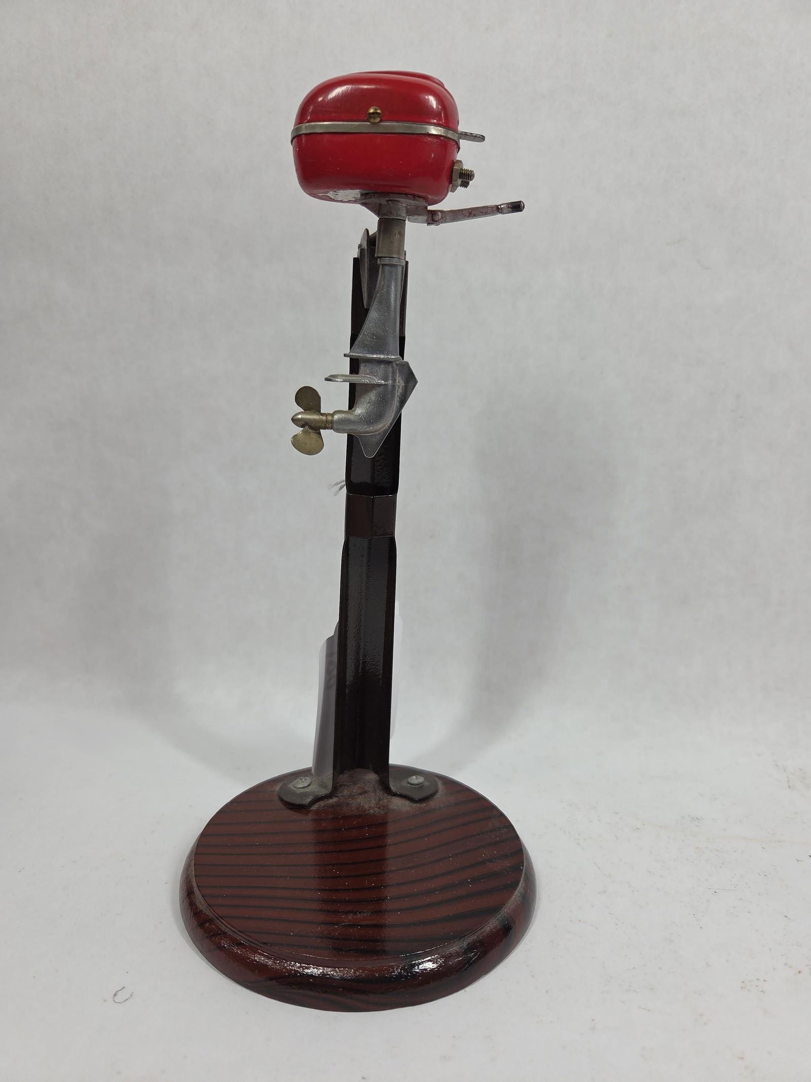 Miniature Outboard Motor On Stand: Japanese tin motor, approx 4 inches tall. Not tested
