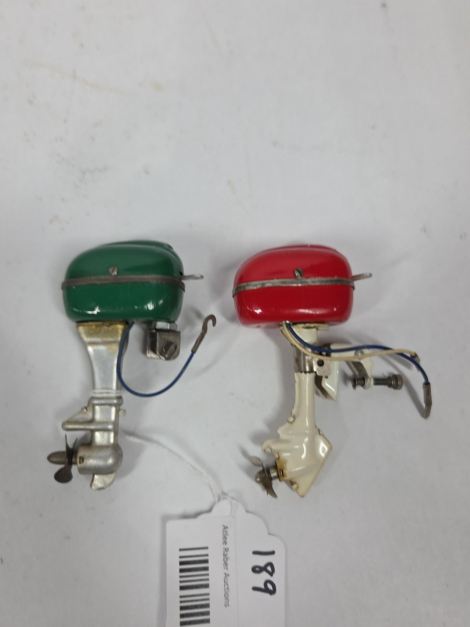 Pair of Miniature Outboard Boat Motors: Each includes wiring and is in good condition. Not tested. 3.5 inches