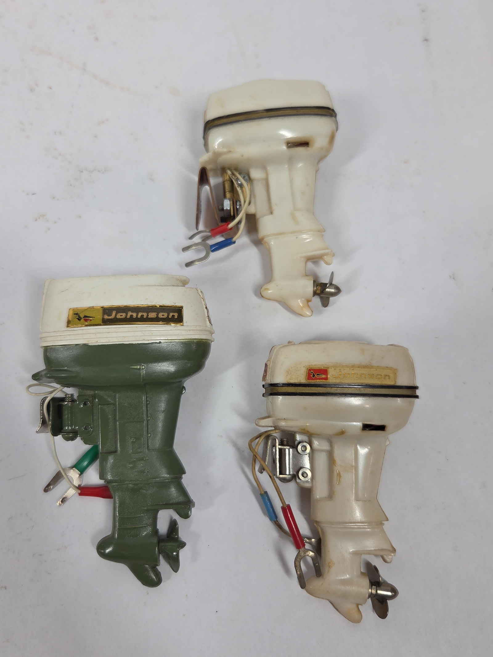 Miniature Johnson Boat Motors: Super Sea Horse and model 40. Each appears to be in good condition with wiring. approx 4 inches. Not tested