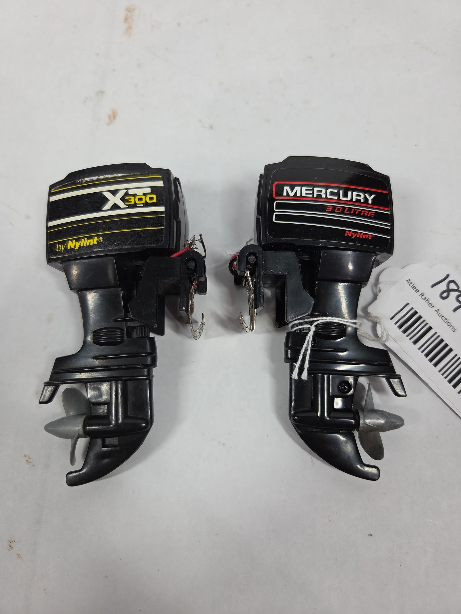 Miniature Outboard Motors: Nylint XT 300, and Mercury 3.0 litre by Nylint. Each is 4.5 inches not tested but looks great.