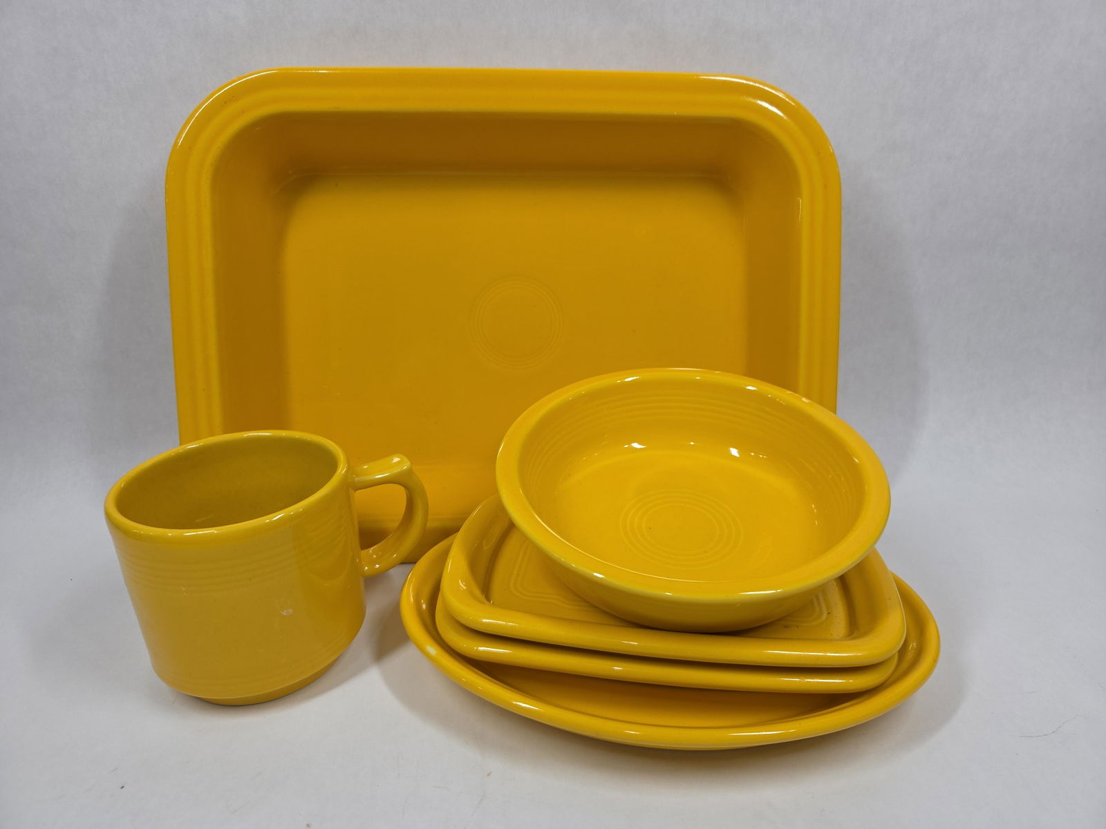 Daffodil Yellow Fiesta Lasagna Pan, Bowls, and Platters: 6 pieces, all in good condition