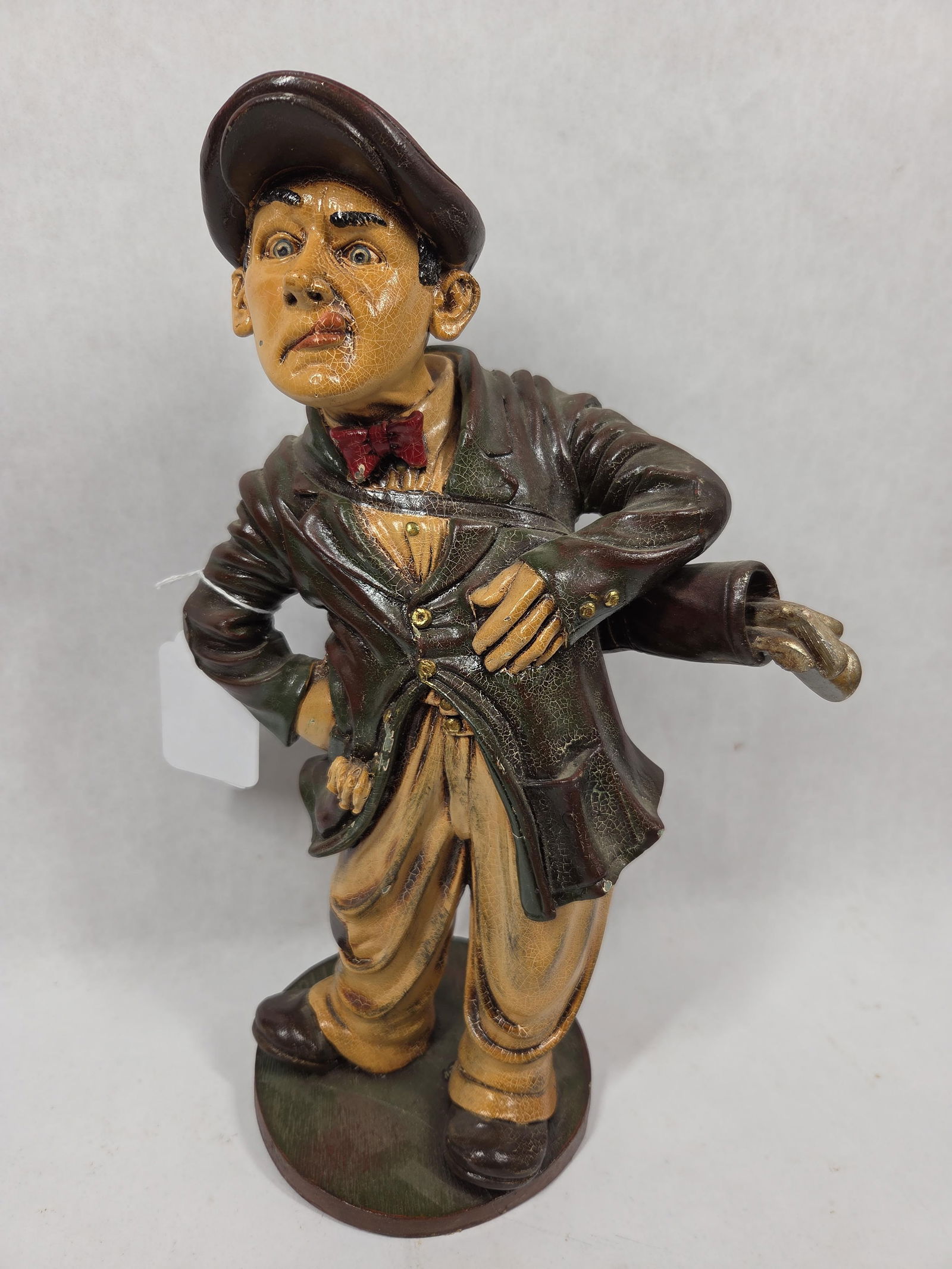 Peter Mook Artist Signed Painted Resin Golfer Sculpture: showing crazing to paint due to age and display standing 14 in. H