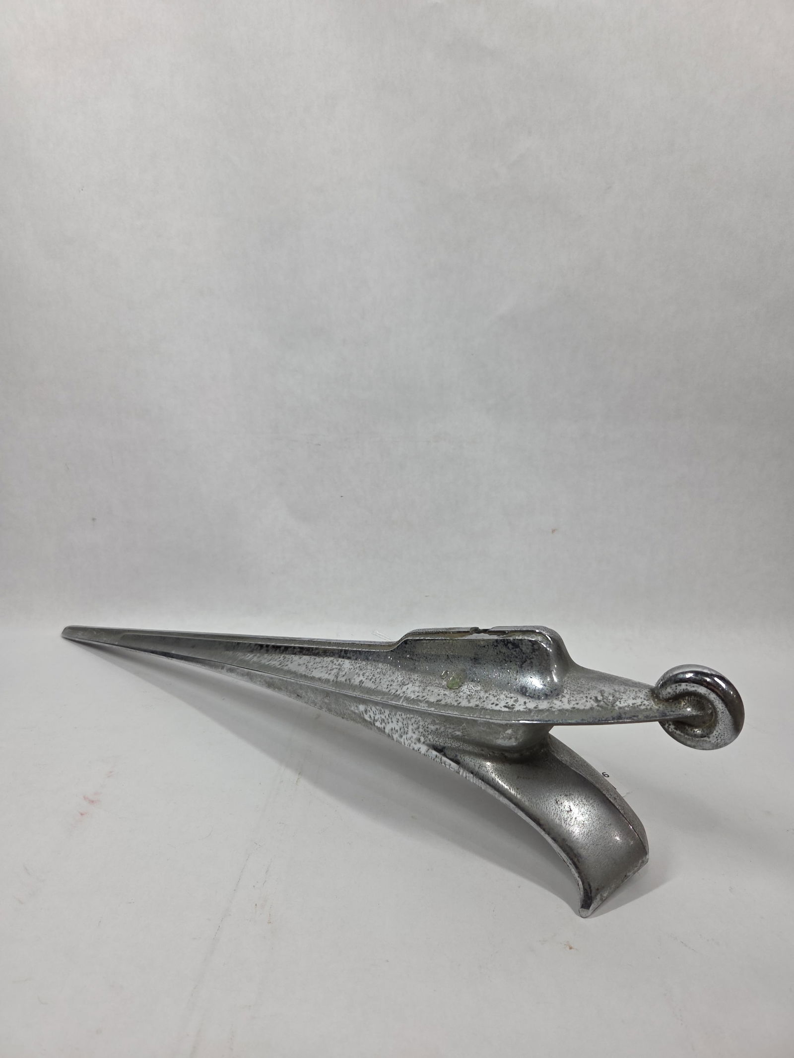 Early Chrome Hood Ornament / Adornment: Missing figural topper measuring 21 in l