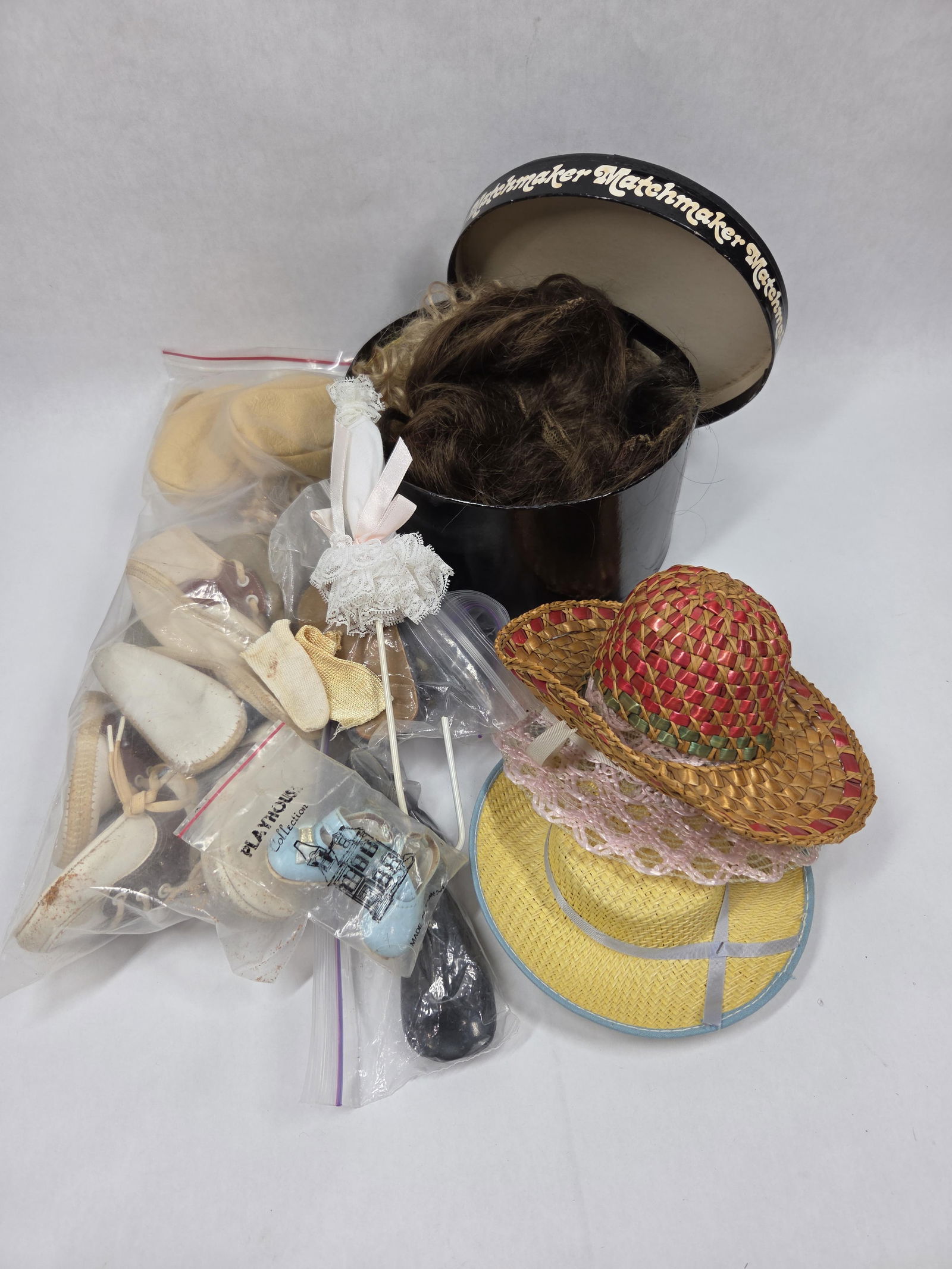 Miniature Hat Box, Doll Hats, and Shoes: Many older pieces. Straw hats, Moccasins, and shoes.