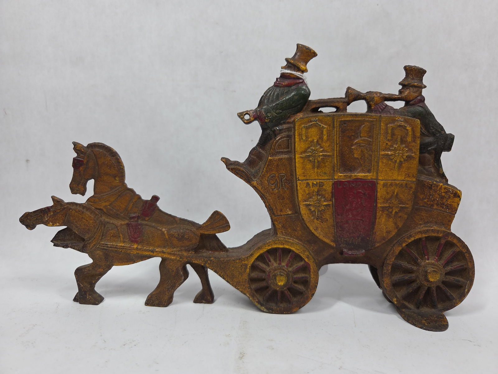 20th C. Cast Iron Poly Chrome Painted London Royal Mail Stagecoach Door Stop: Great overall color with areas of fading as to be expected due to age and usage? 12.5 x 7.5