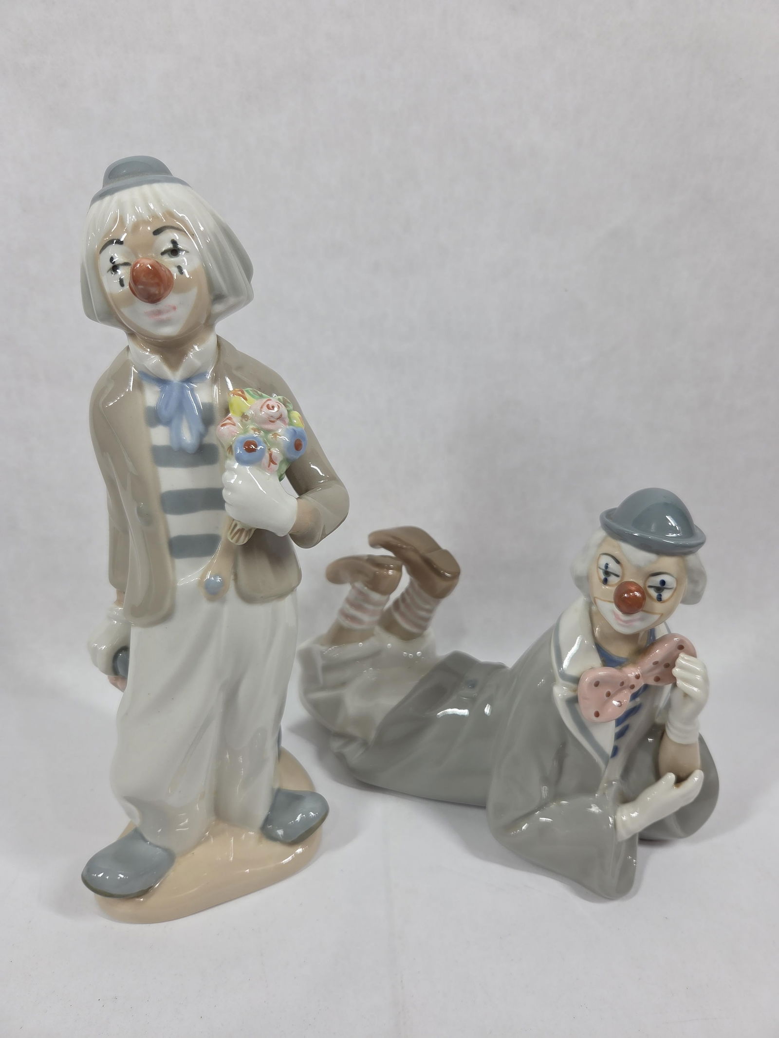 Napco Porcelain Casades Clowns: Both are great with no chipping or cracks. 11 and 7 inches tall.