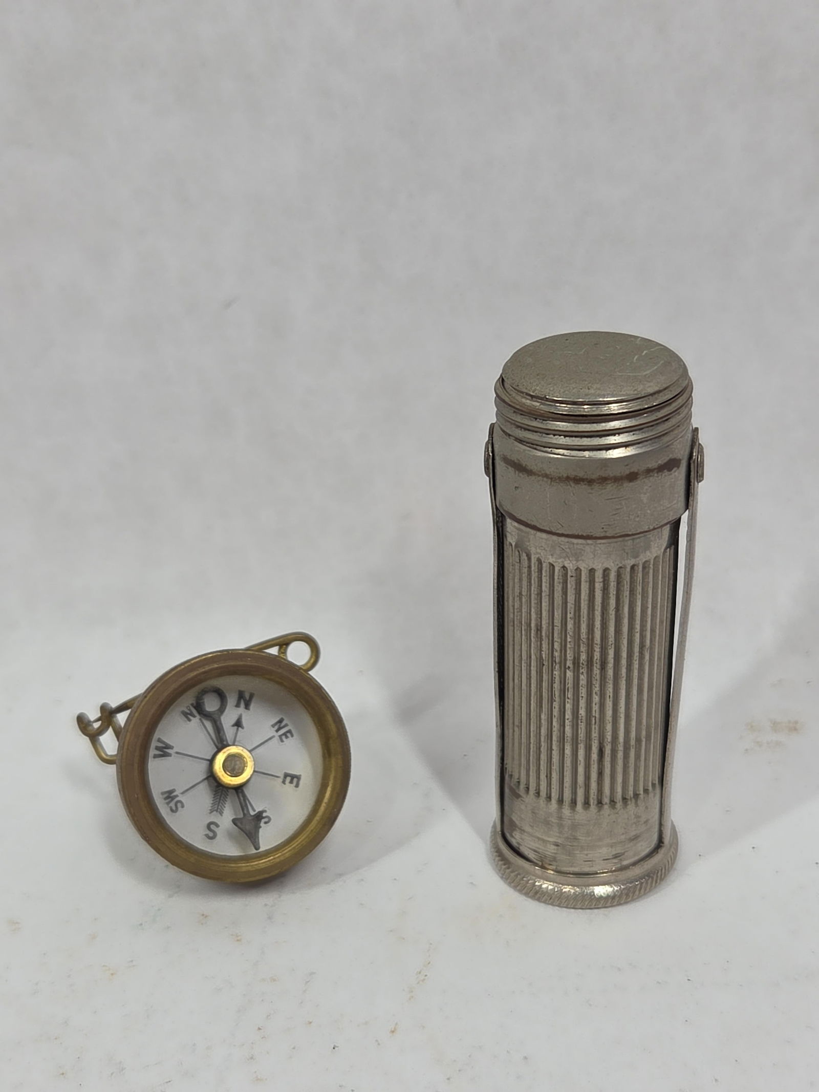 Marbles Pinback Hunting Compass and Waterproof Match Holder: Both are in excellent condition.