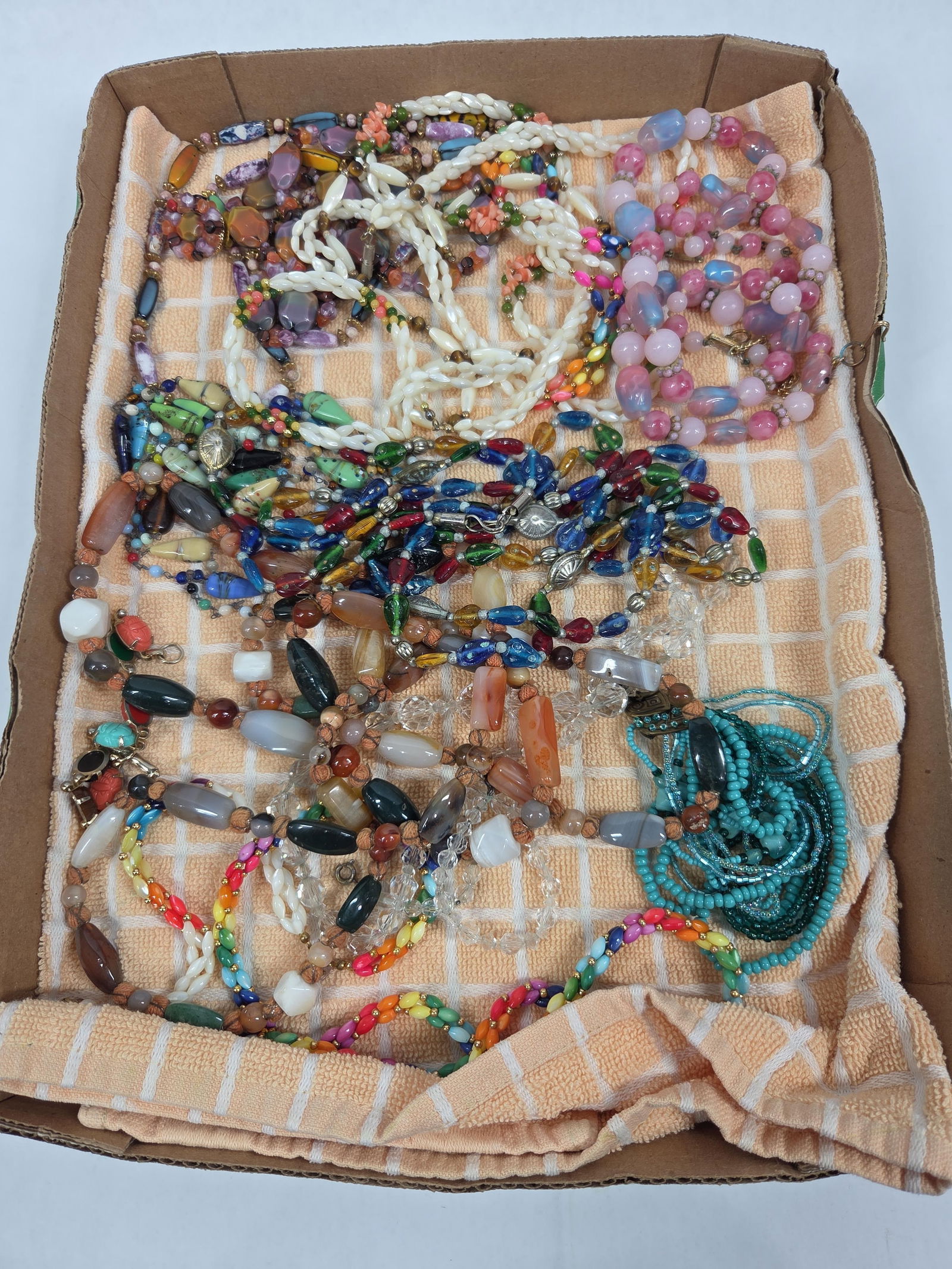 Art Glass Beaded Jewelry: Hand blown and Italian glass beads. These are older pieces in good condition.