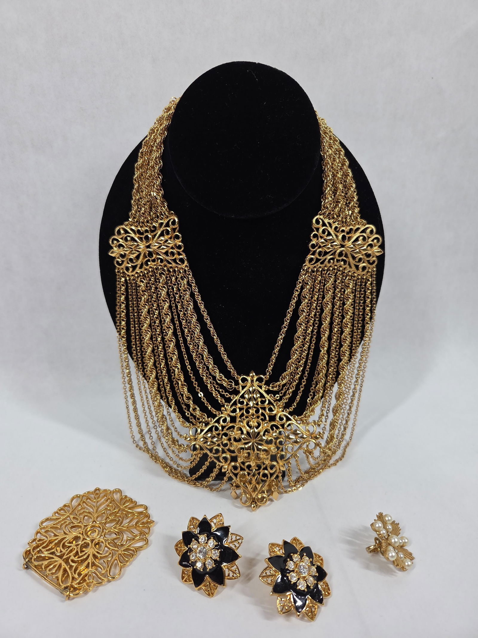 Gold Tone Chains, Brooches, and Jewelry: Napier, Monet, and other name brands.