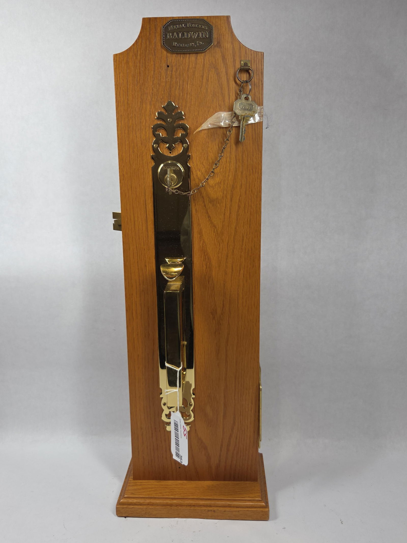 Baldwin Brass Door Lock Salesman Sample: Reading Pa, Oak door with brass hardware. 26x7.5
