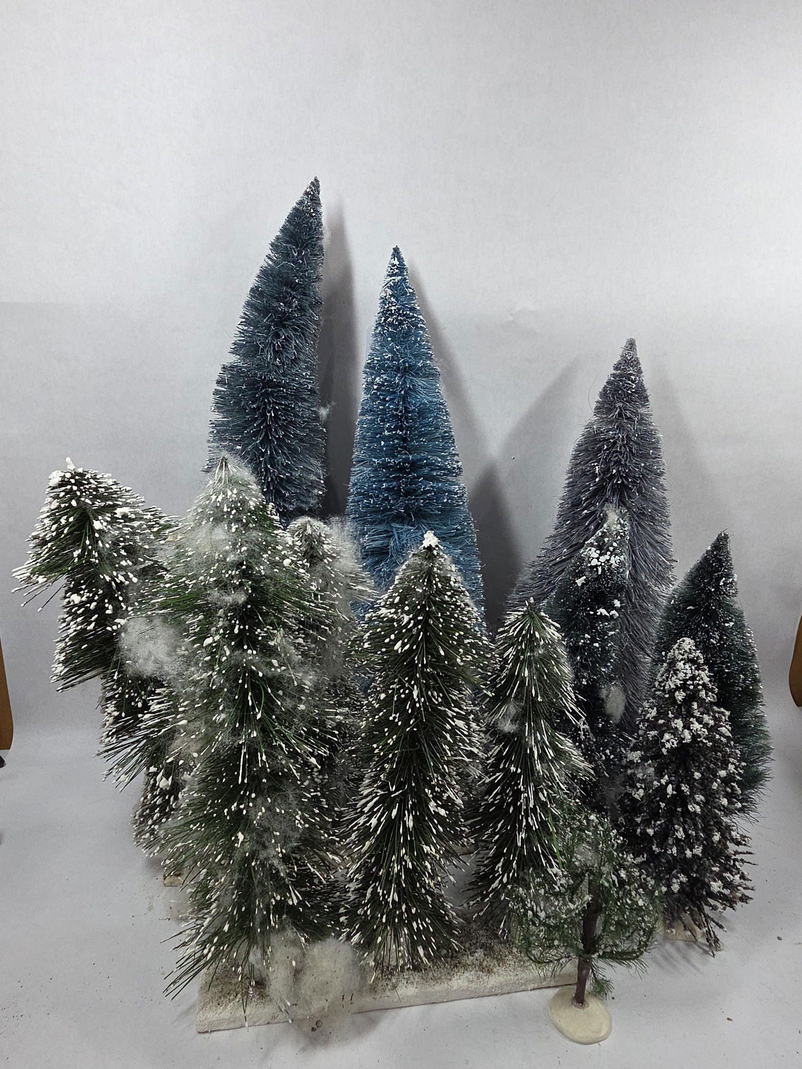 Great Vintage Lemax Bottle Brush Flocked Christmas Trees of Various Sizes: This lot of 13 assorted bottle brush trees are a great addition to any holiday display ranging in size from 6 in to 22 in