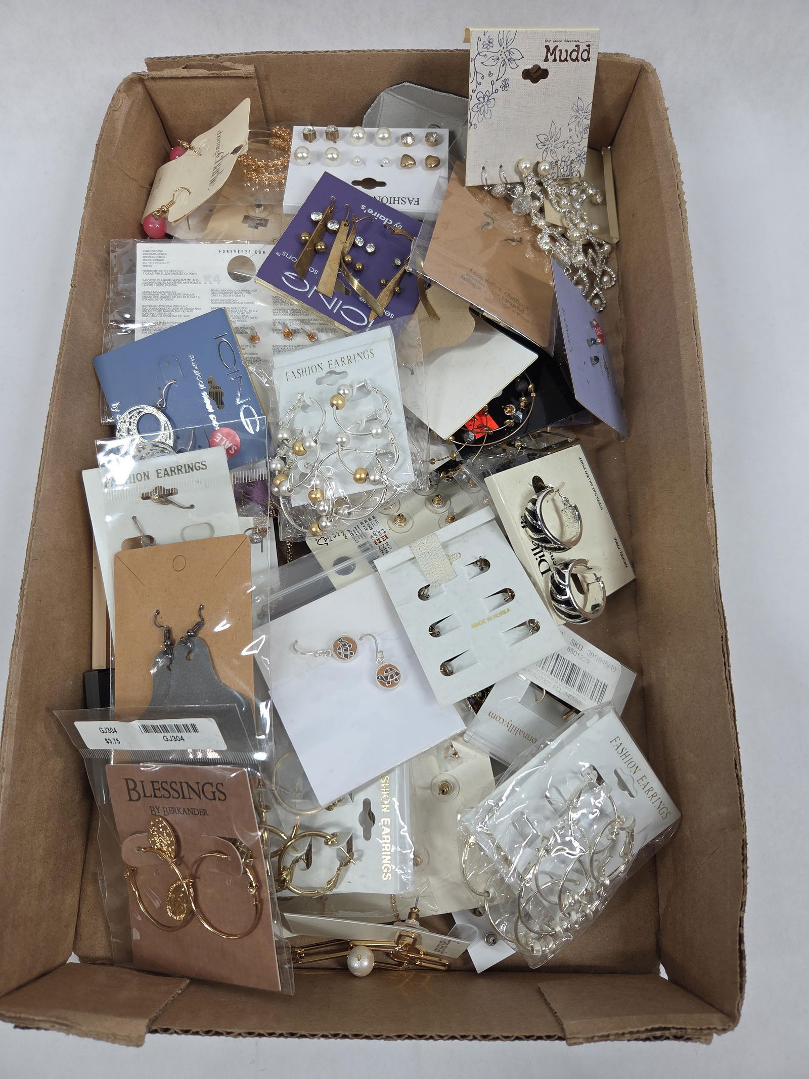 Fashion Earrings and Jewelry: Mostly new, but great variety.