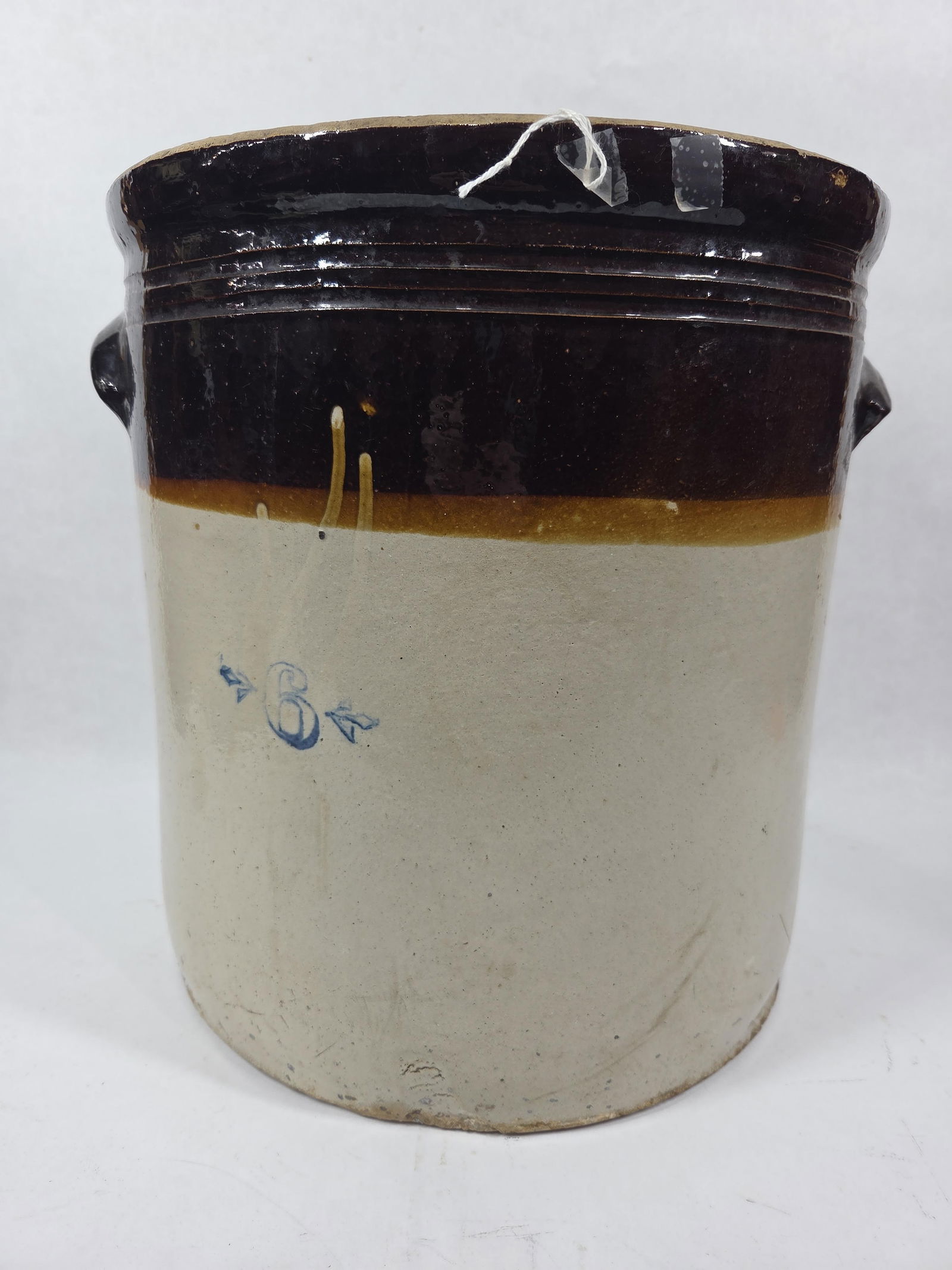 Salt Glazed Two Toned Handled 6 Gal Crock: Showing minor flaking and manufacturer flaws only
