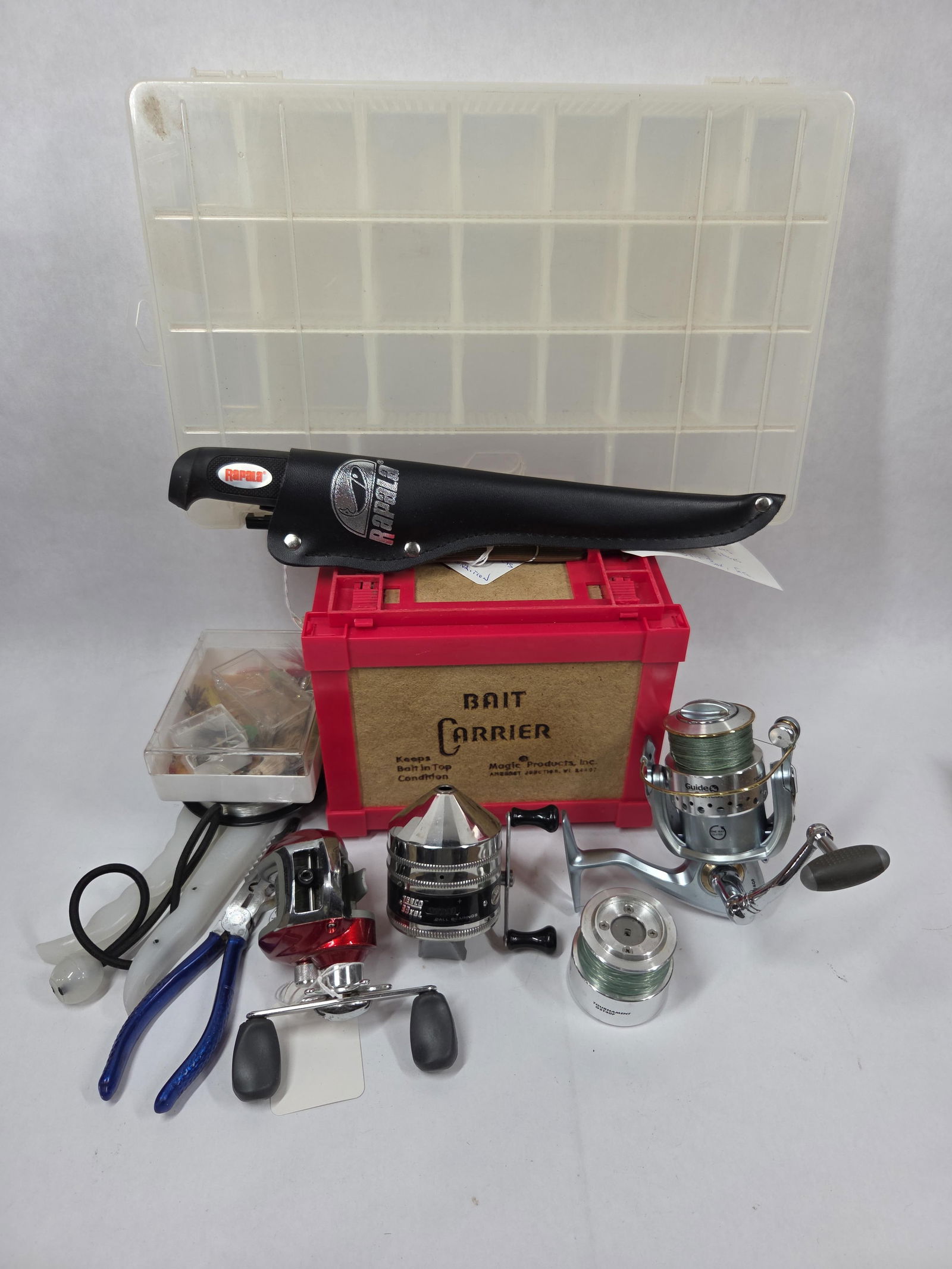 Magic Products Bait Carrier, Pflueger and Zebco Reels, Organizer, Filet Knife and More: This great vintage fishing lot includes 3 like new reels and bait carrier also like new condition with a new organizer, filet knife and multiple accessories