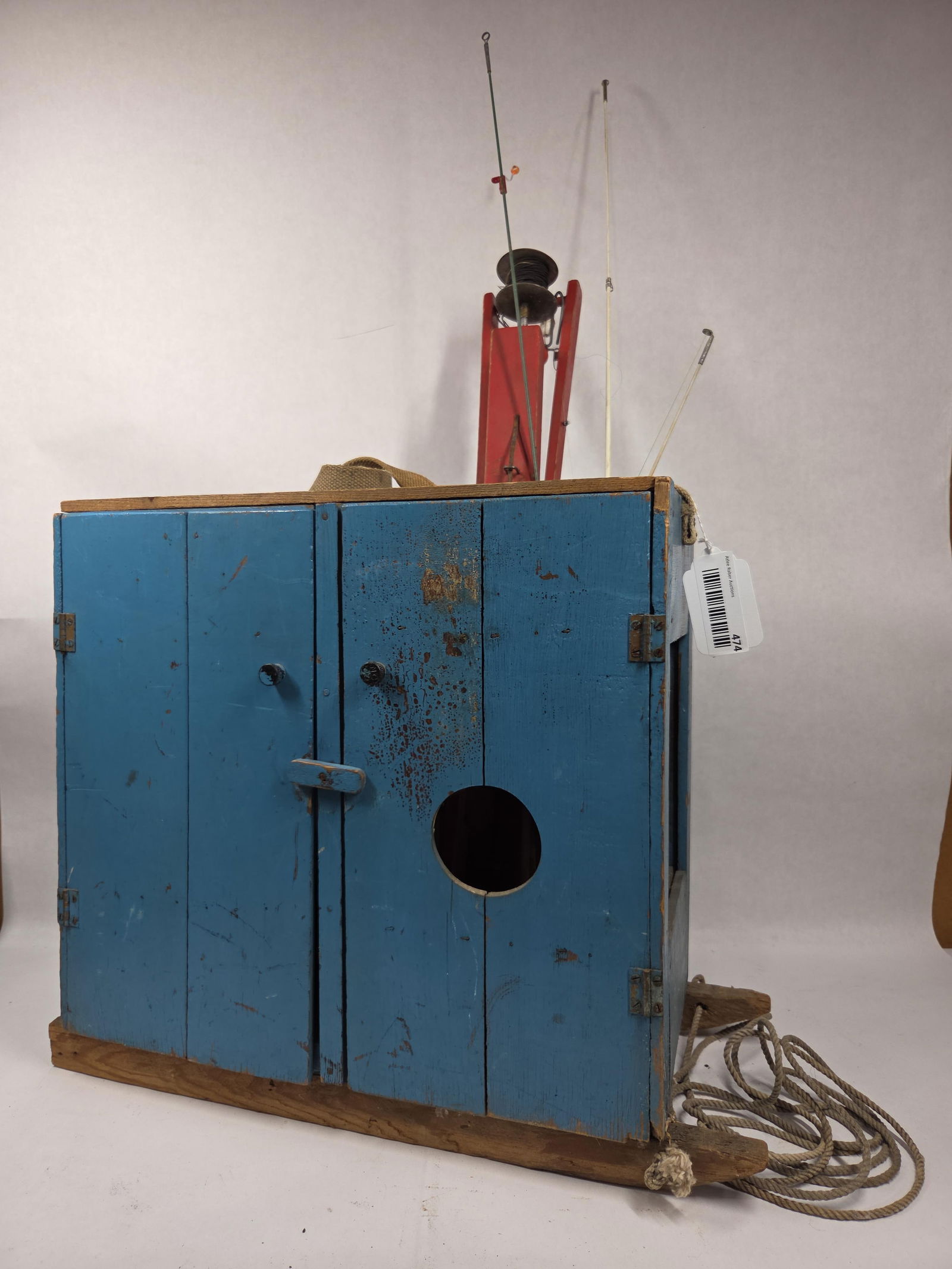 Ice Fishing Sled w/ Lantern and Gear: A primitive blue painted sled caddy, holding a pole, and old red barn lantern. A cute usable piece or for decor. 16x16.5x9