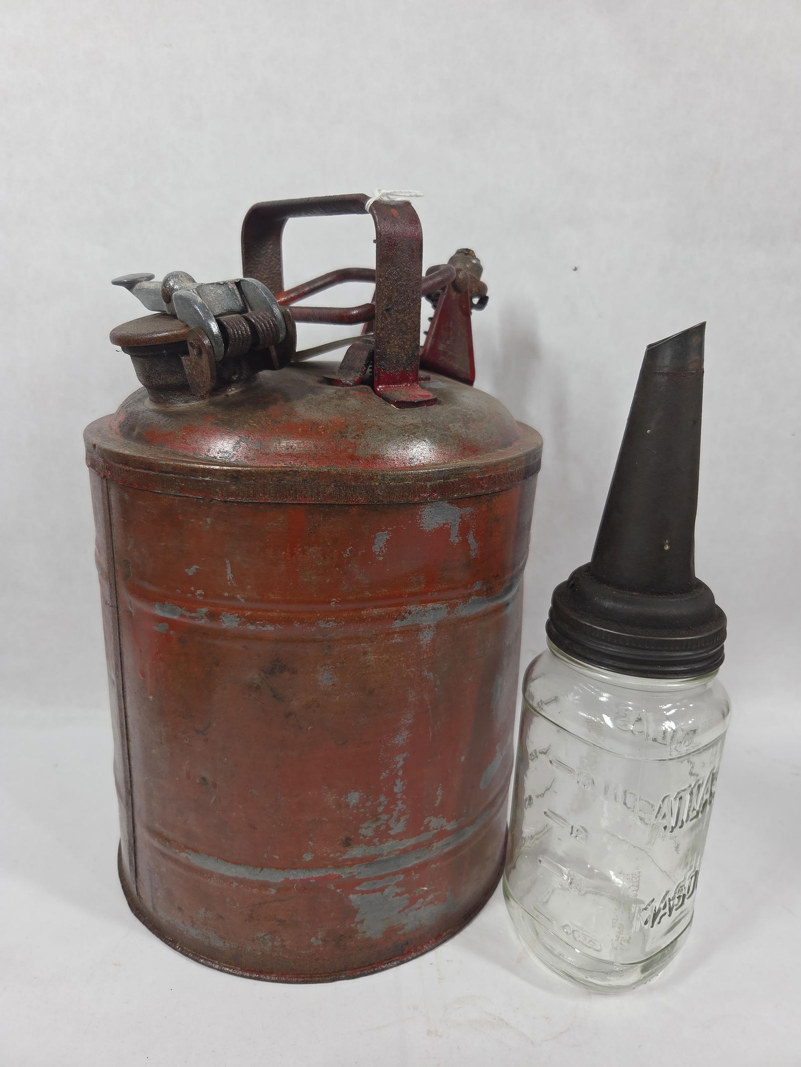 1930's Protecto Seal Fuel Safety Can and Atlas Mason Jar Oil Bottle w/ Spout: Great condition to can and bottle with can having original brass Underwiters Lab. Tag