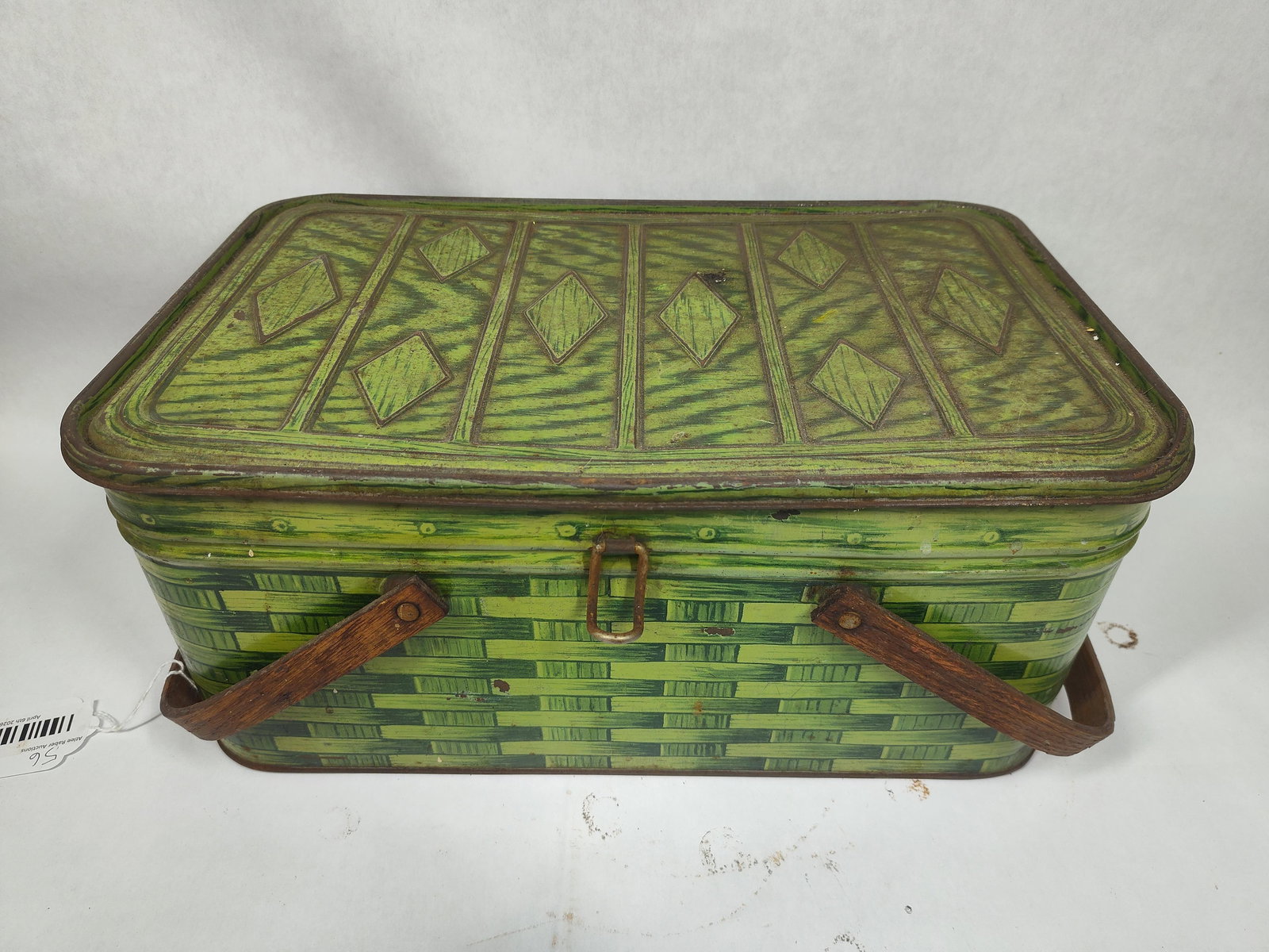 Mint Green Tin Picnic Basket: A printed basket weave with wooden handles and vent holes on back. Top shows some dirt that should be able to come clean. 16x10x7